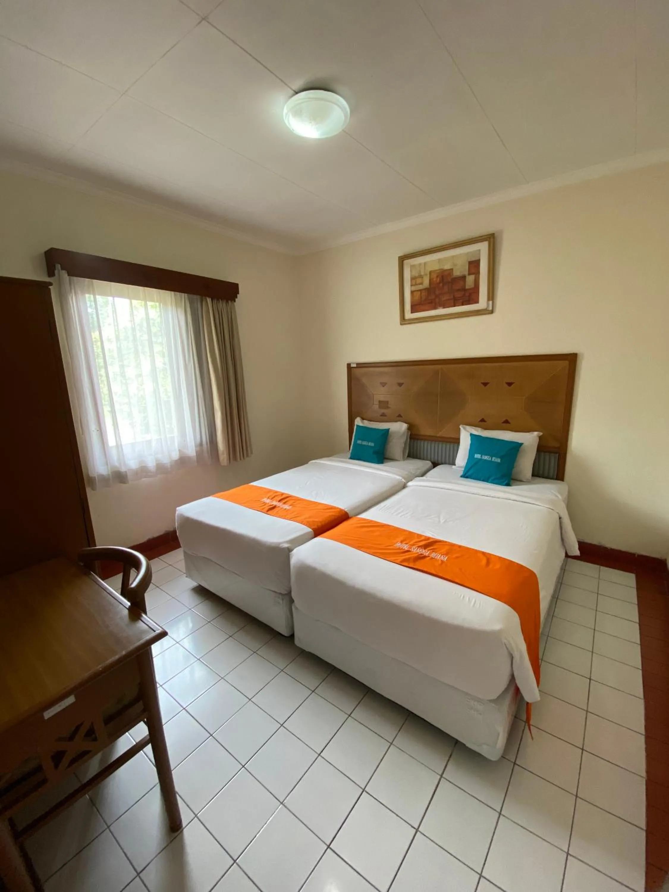 Bed in Sangga Buana Resort & Convention Hotel
