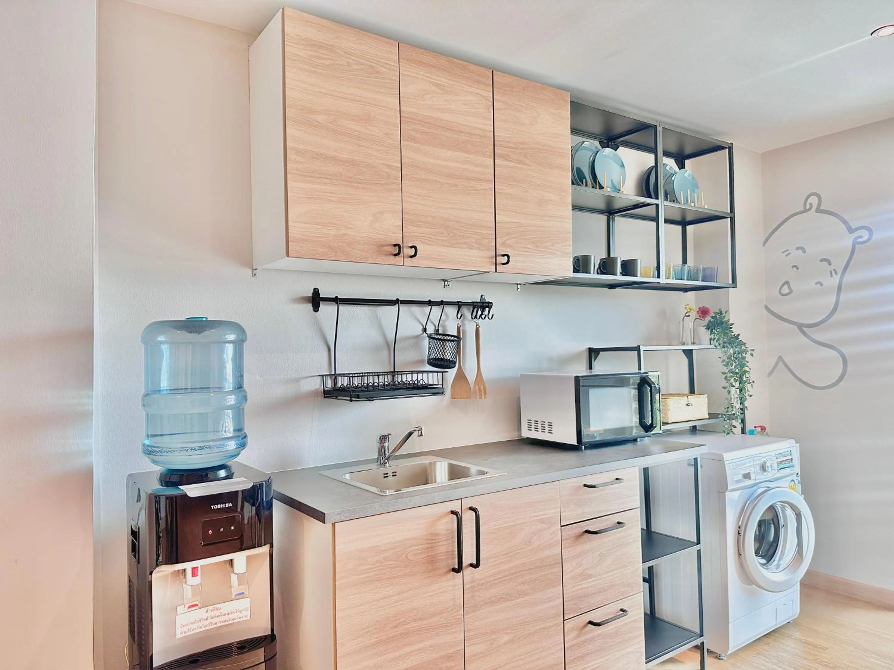 Communal lounge/ TV room in Herma Hotel