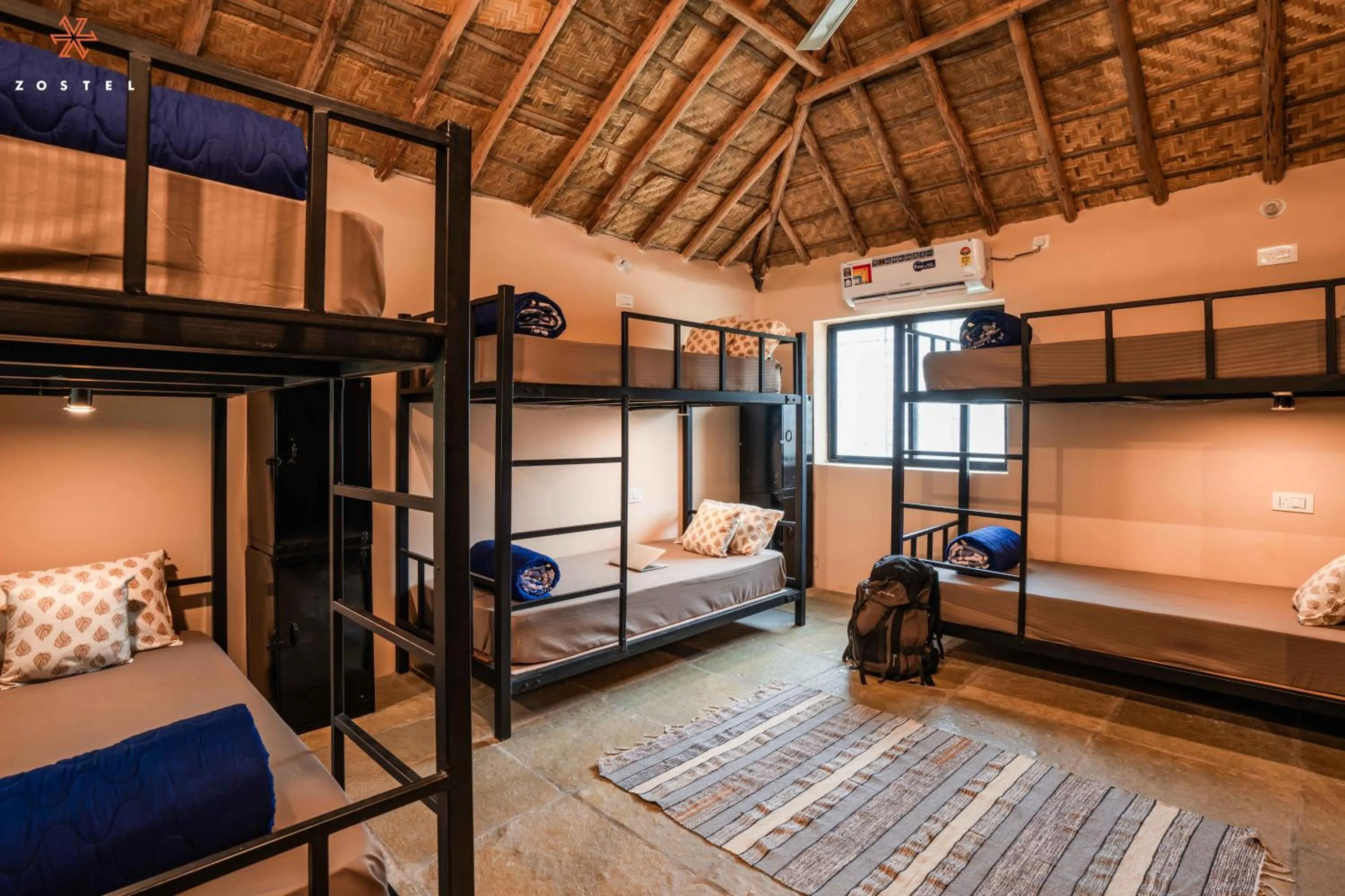 Bed in Zostel Hampi, Gangavathi