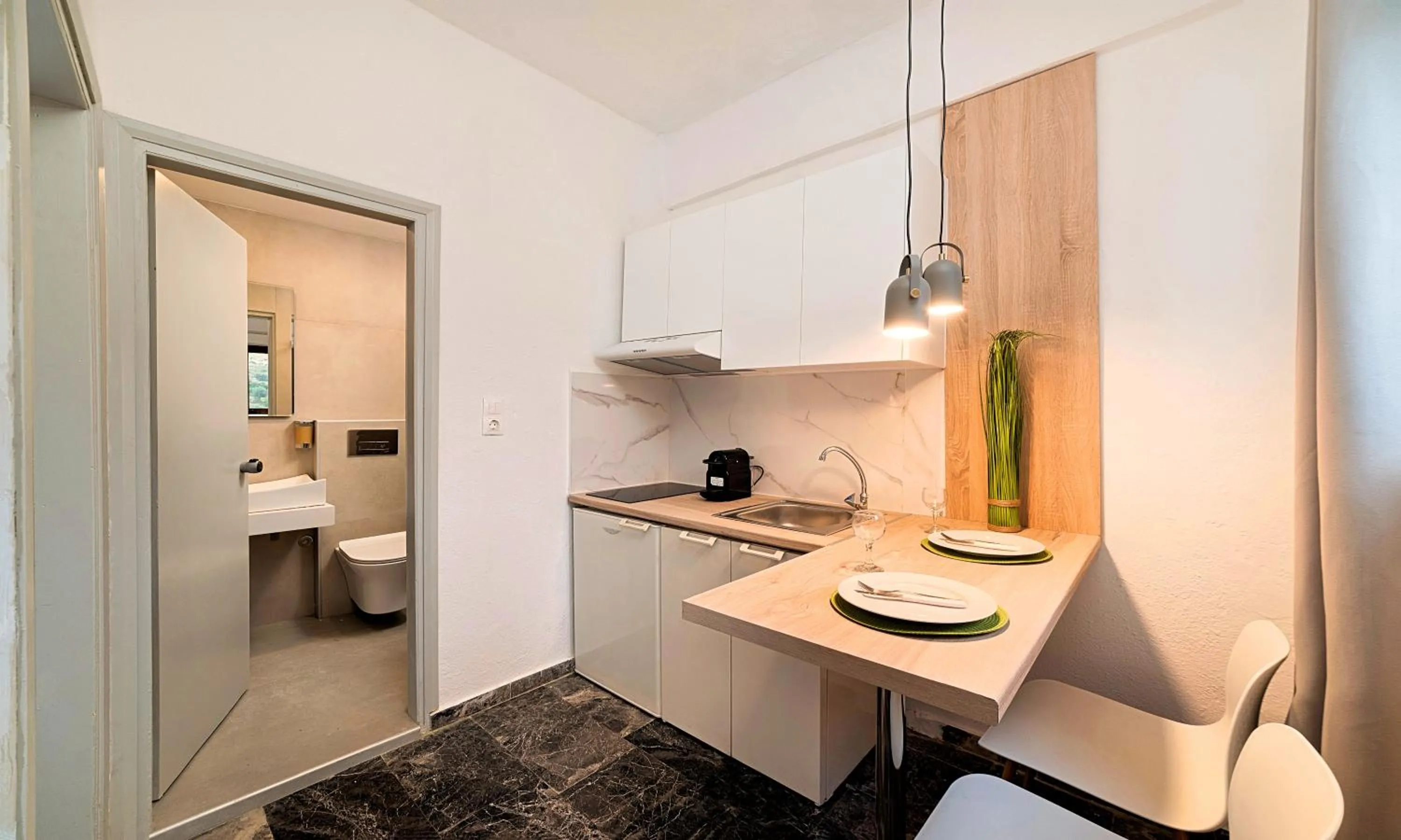 Toilet in Welcome Apts