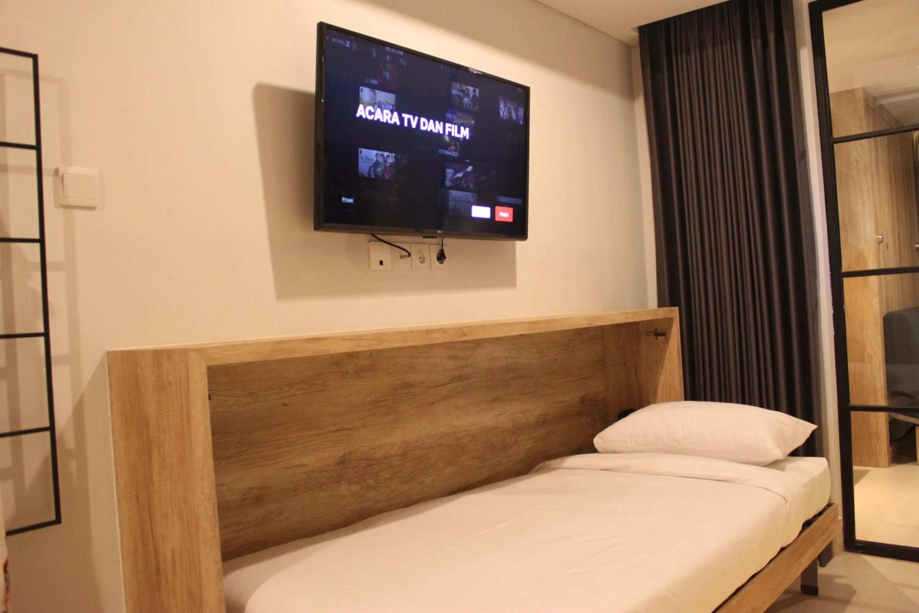 Communal lounge/ TV room in Anagata Hotels and Resorts Tanjung Benoa
