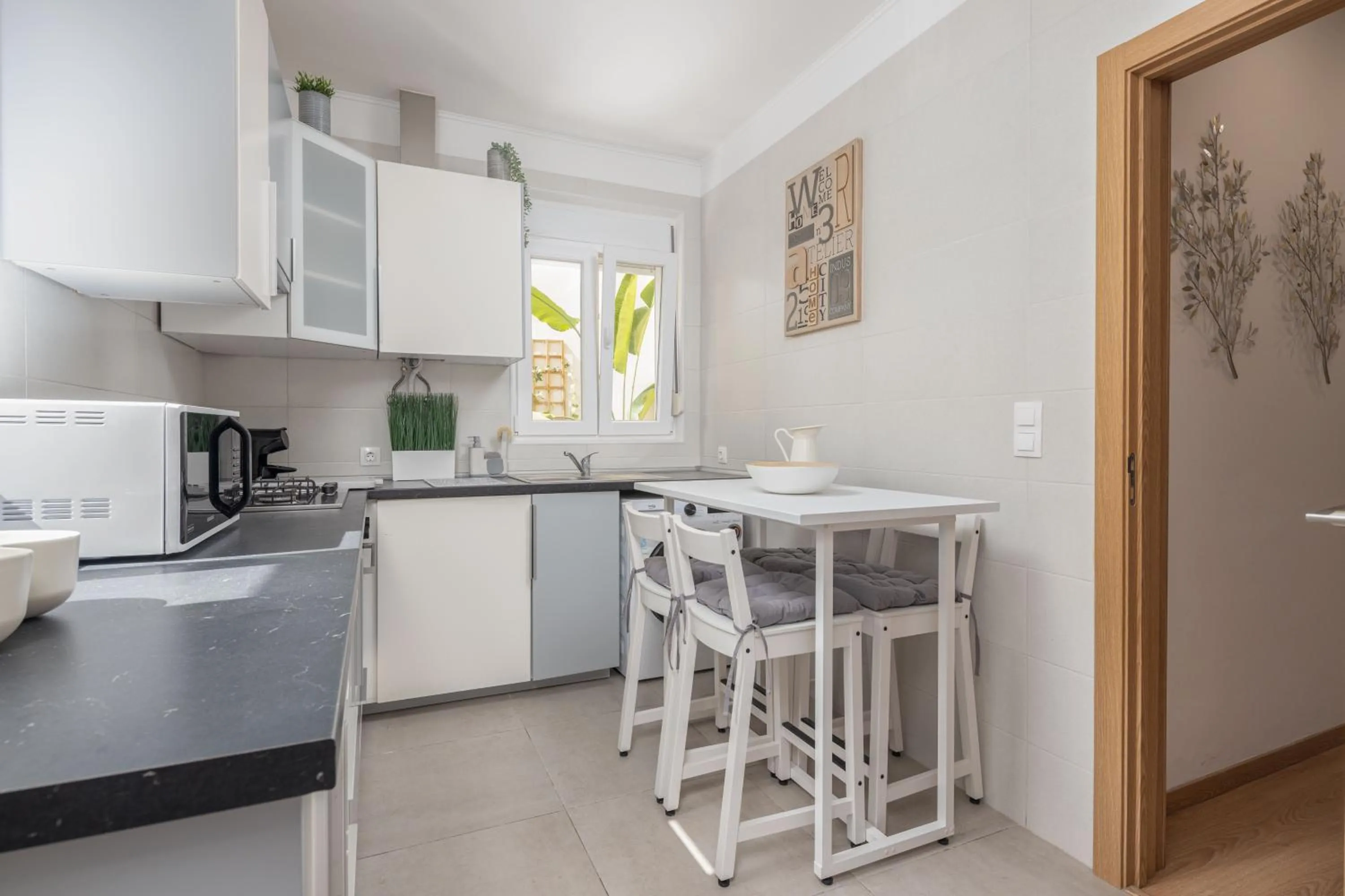 Kitchen or kitchenette in Serene 2BDR Apartment W/ Patio by LovelyStay