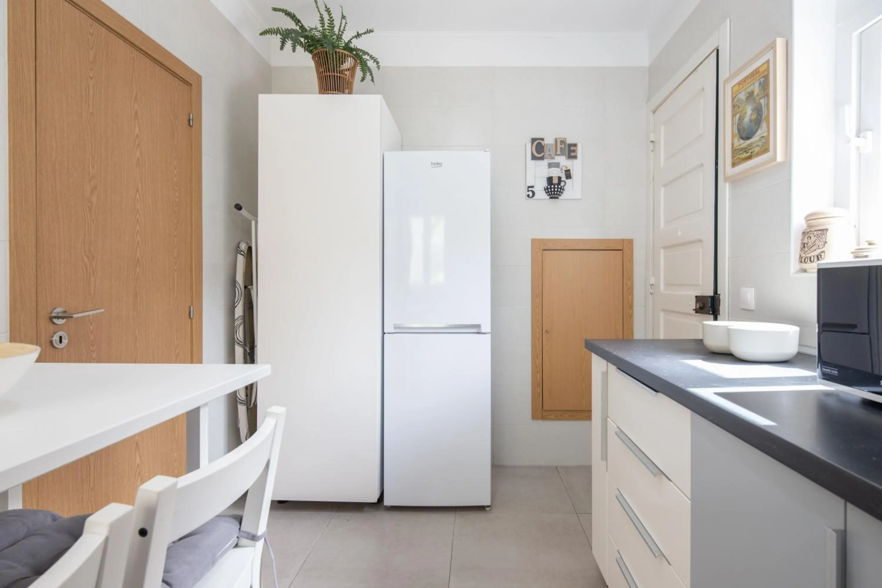 Kitchen or kitchenette in Serene 2BDR Apartment W/ Patio by LovelyStay