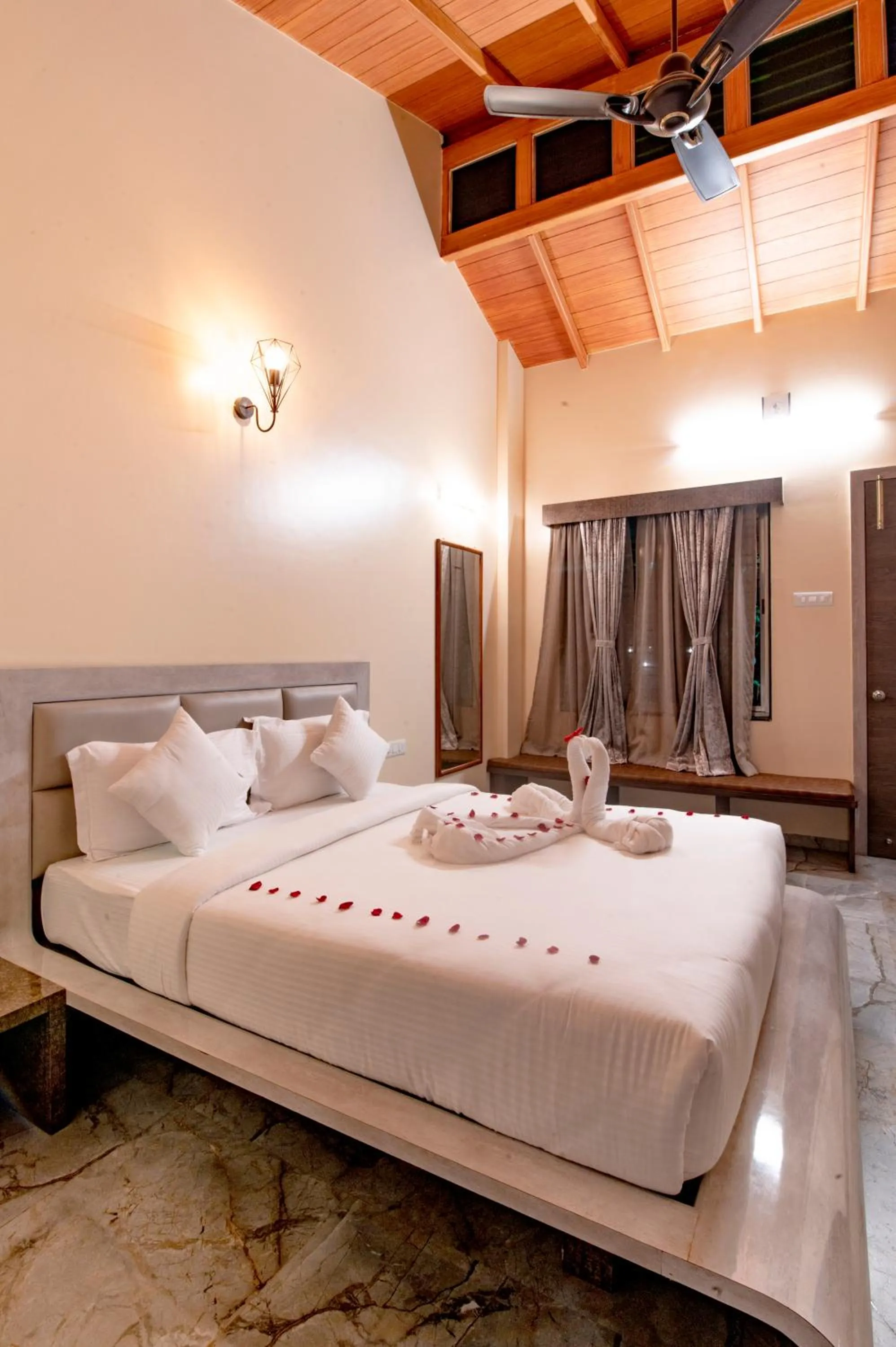 Bed in Freesia Resort by Express Inn