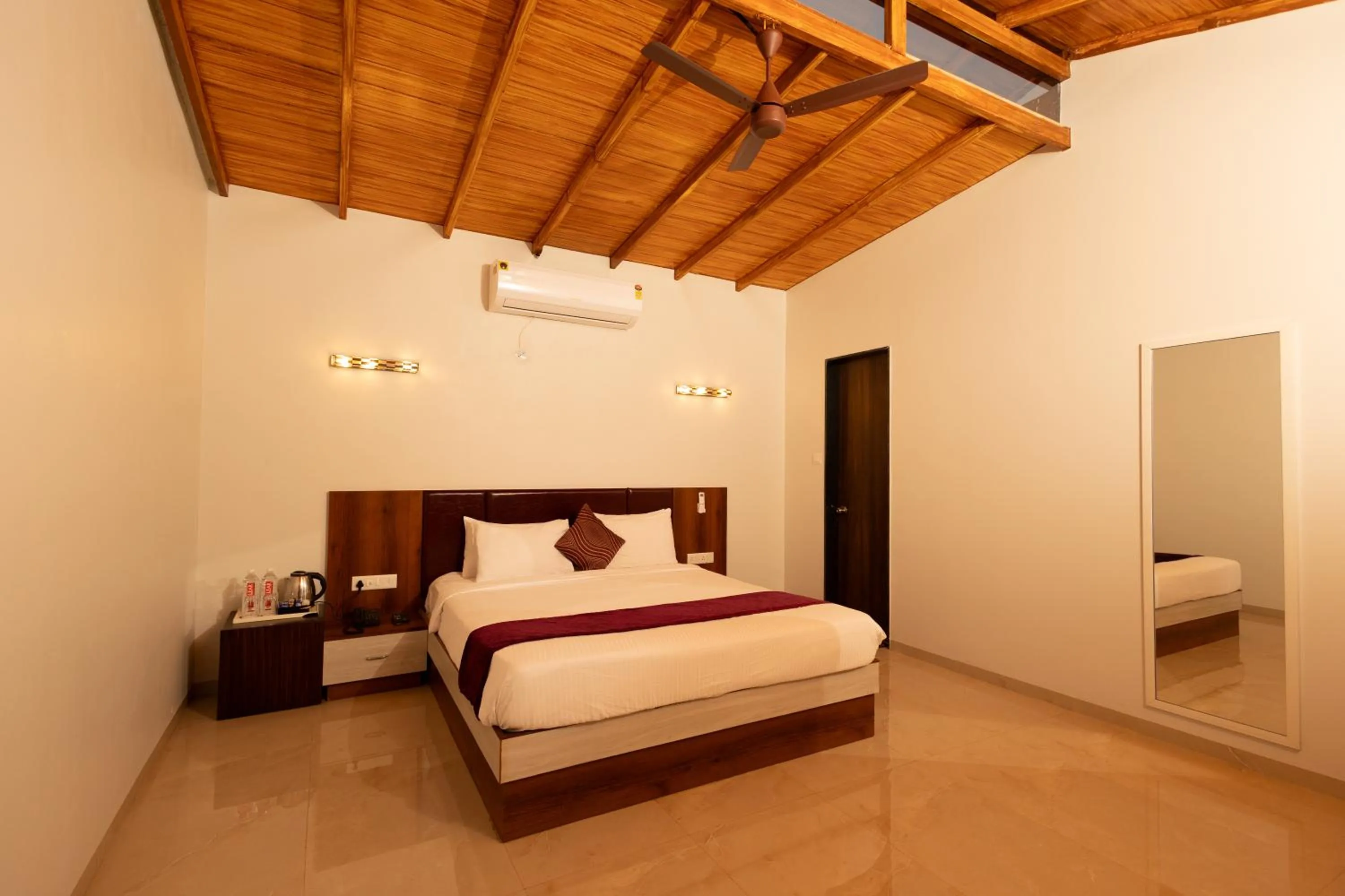Bed in Freesia Resort by Express Inn