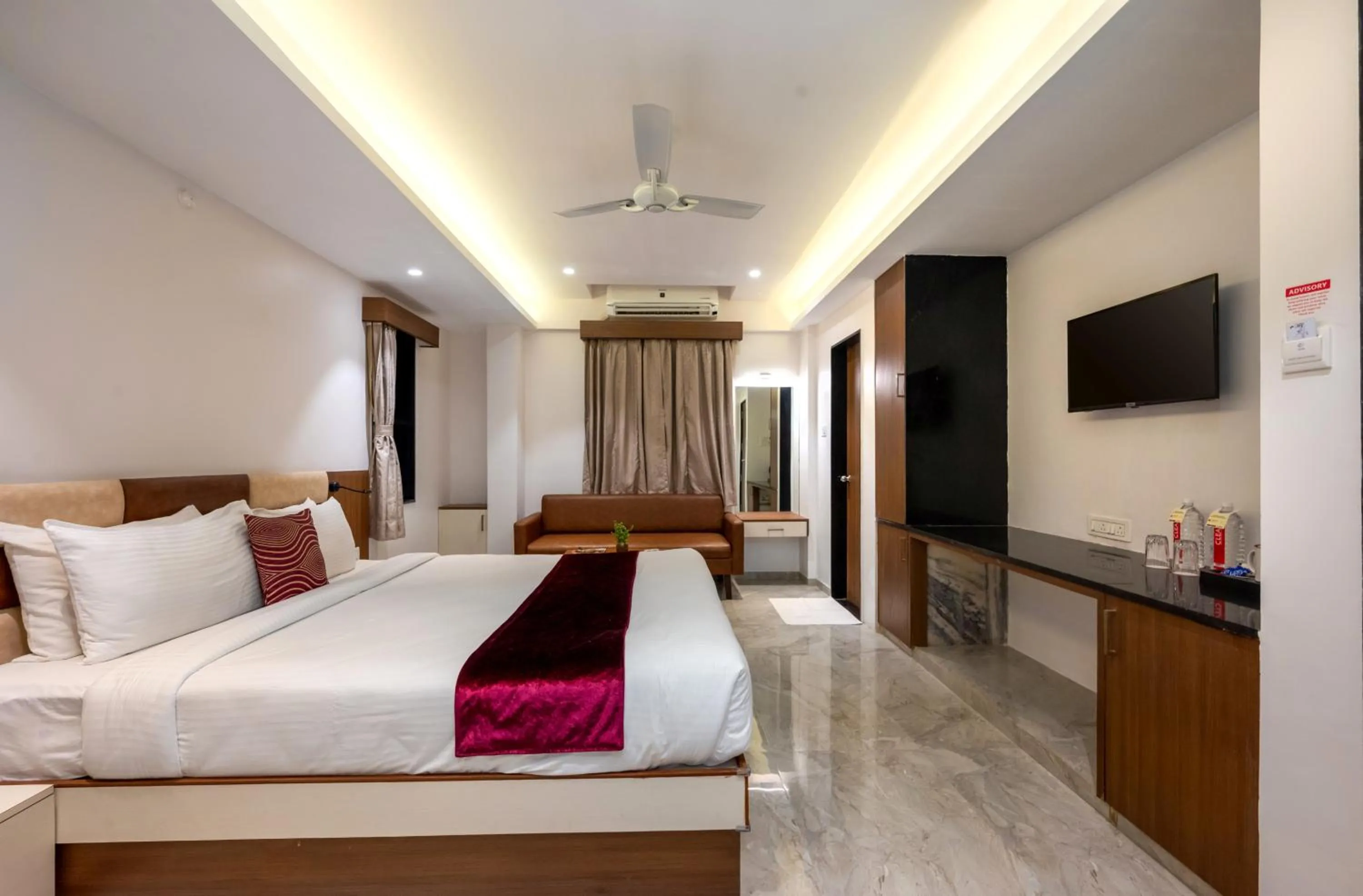 Bed in Freesia Resort by Express Inn