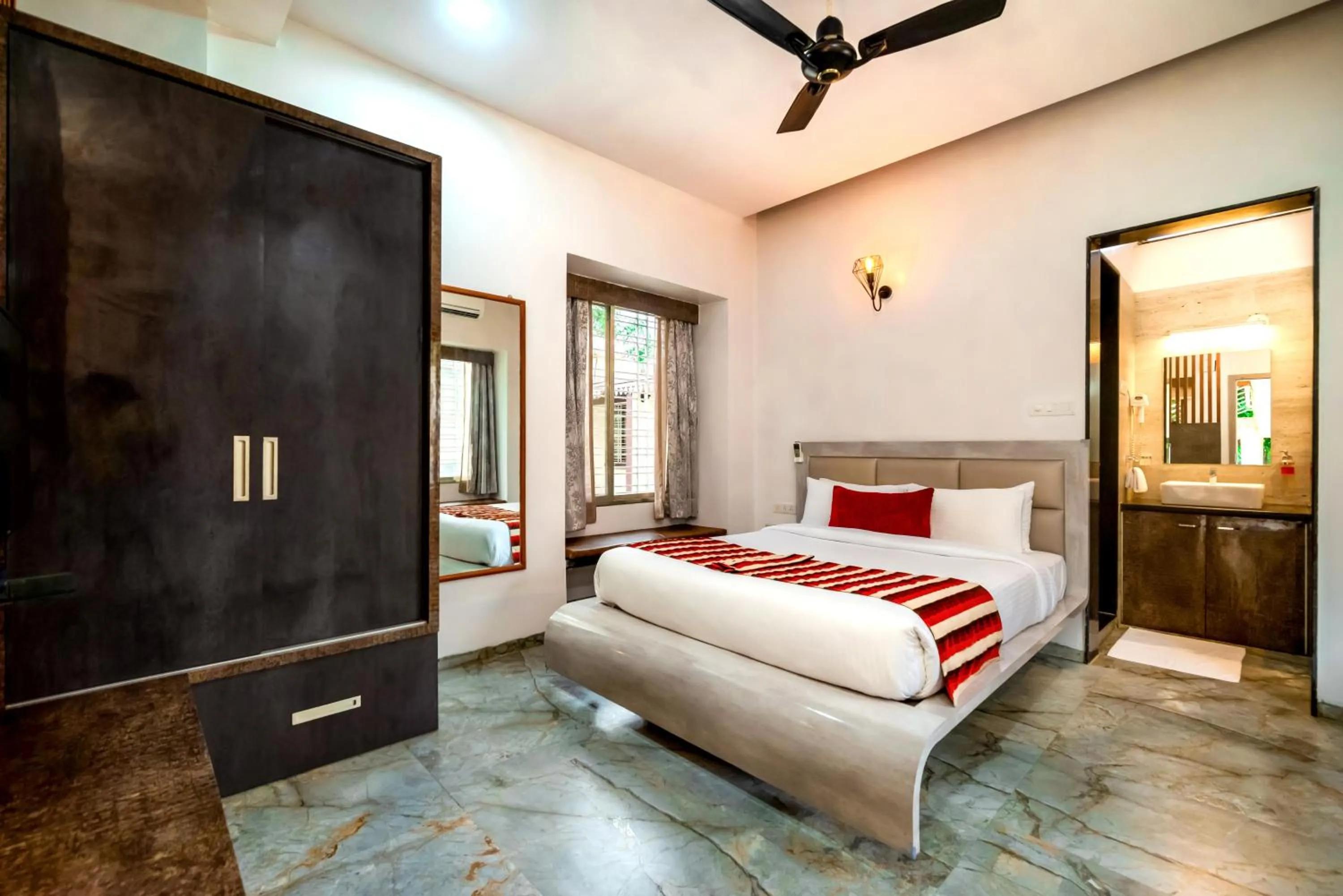 Bed in Freesia Resort by Express Inn