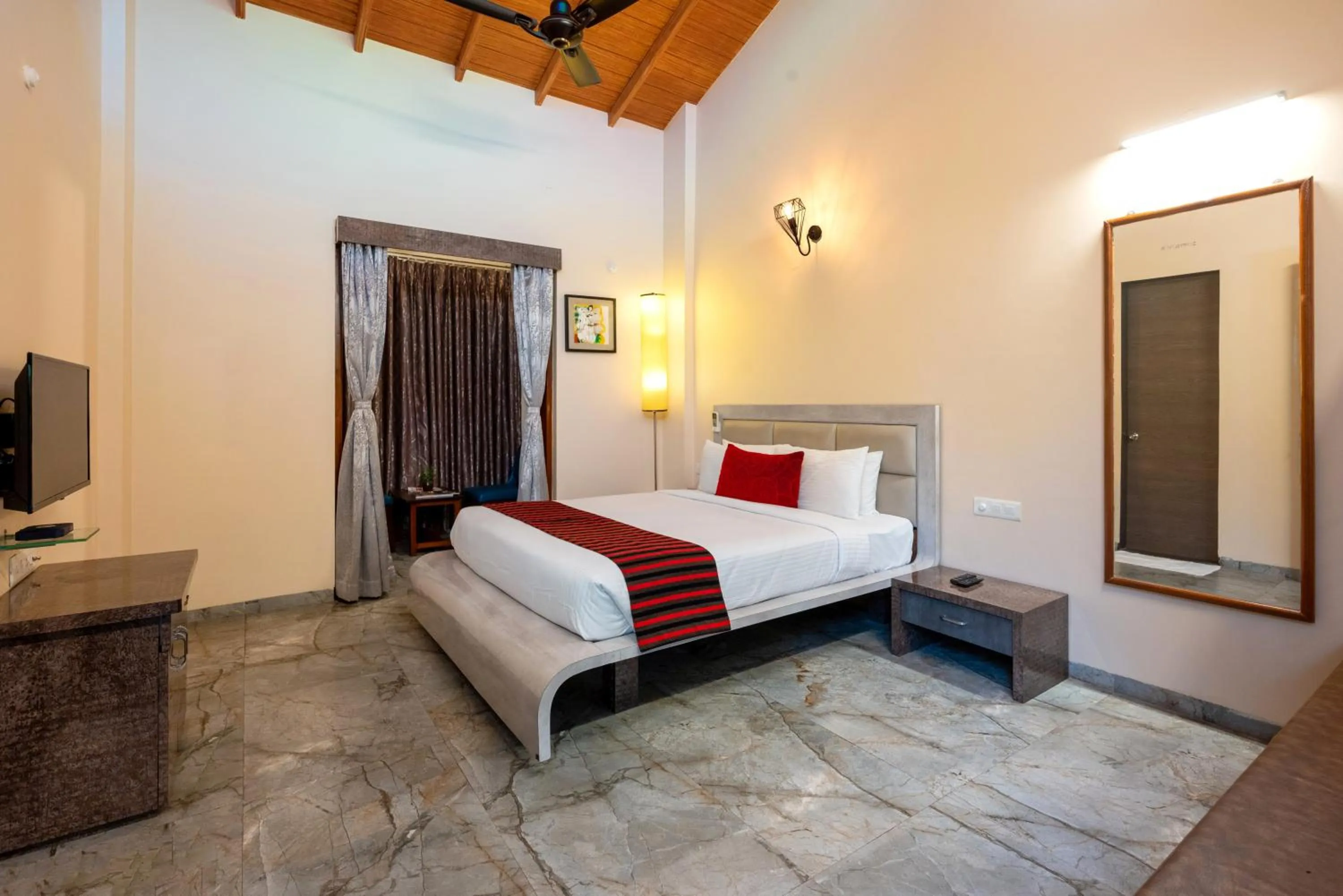 Bed in Freesia Resort by Express Inn