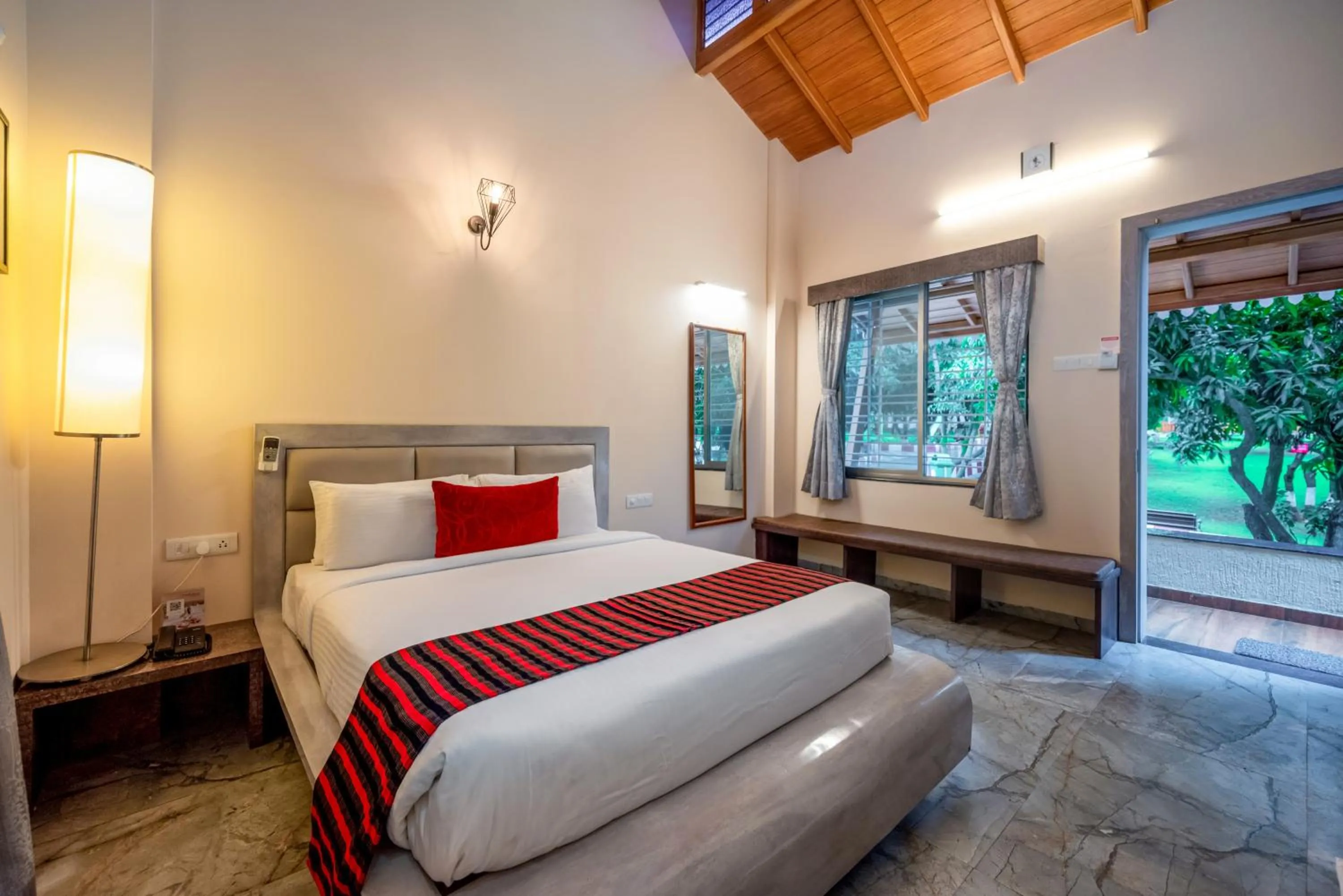 Bed in Freesia Resort by Express Inn