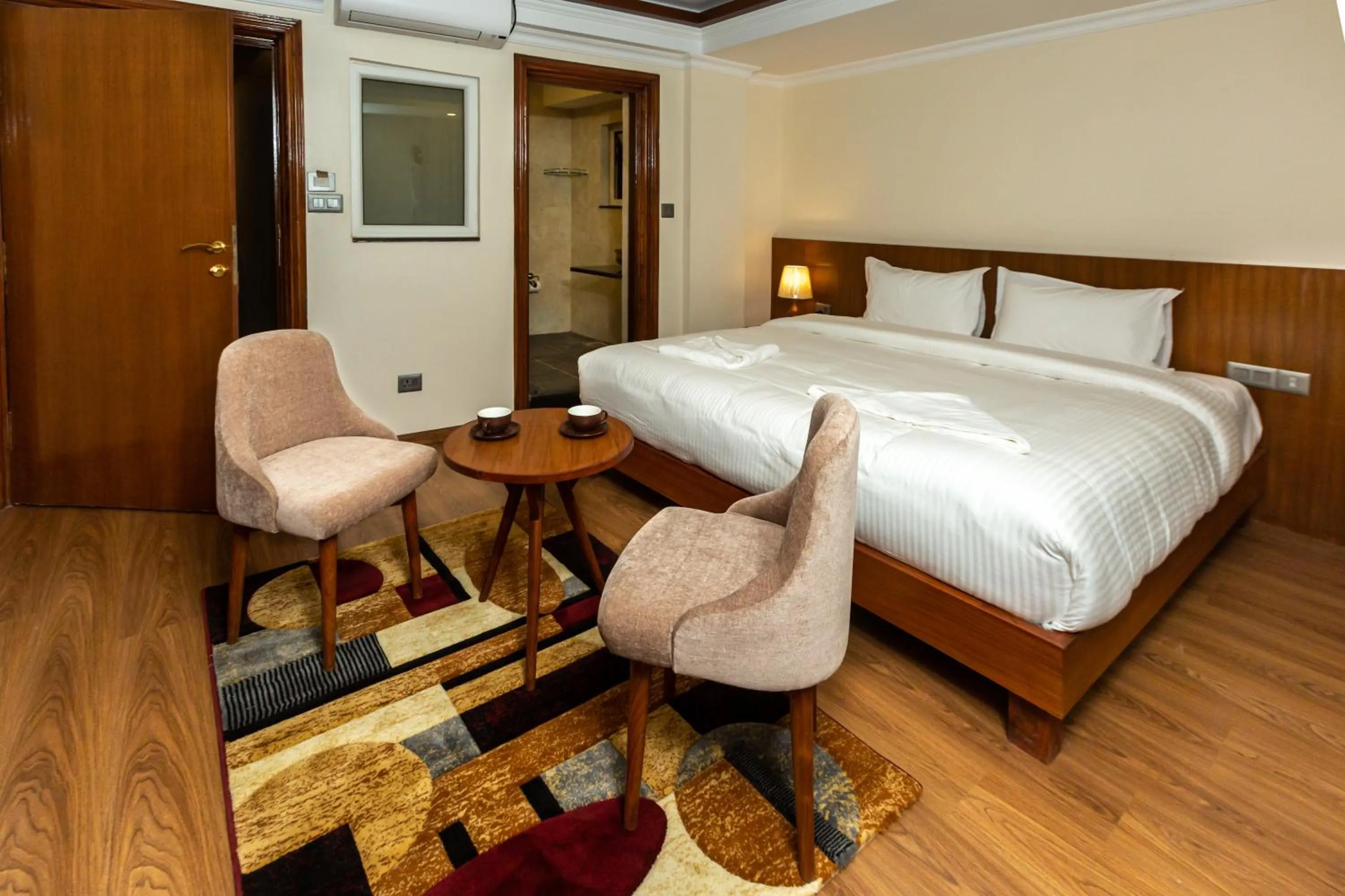 Bed in Darbar Heritage Inn