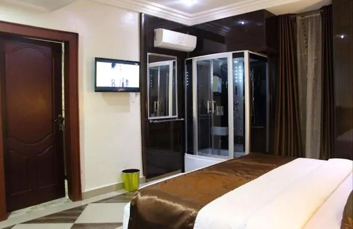 Bed in E-Suites Hotel, Abuja