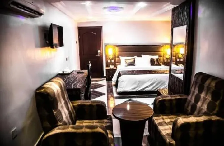 Bed in E-Suites Hotel, Abuja