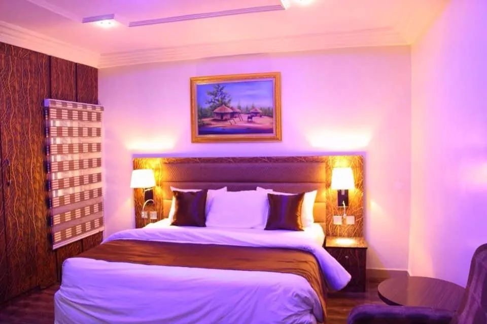 Bed in E-Suites Hotel, Abuja