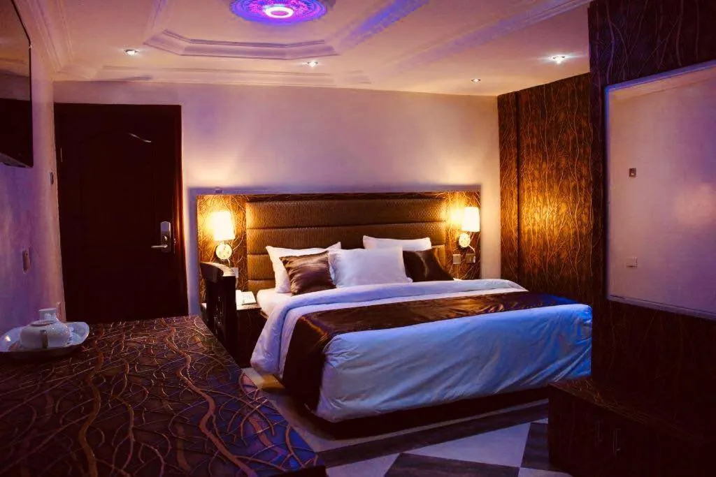 Bed in E-Suites Hotel, Abuja
