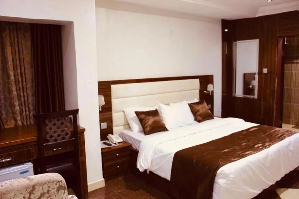 Bed in E-Suites Hotel, Abuja