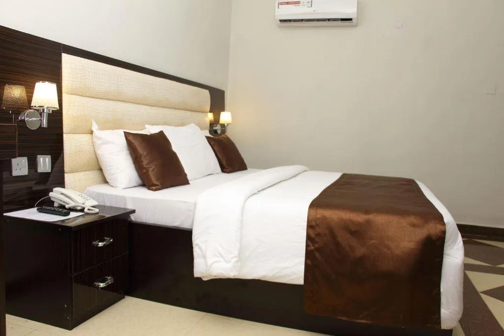 Bed in E-Suites Hotel, Abuja