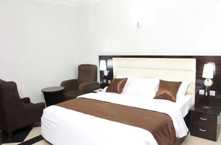 Bed in E-Suites Hotel, Abuja