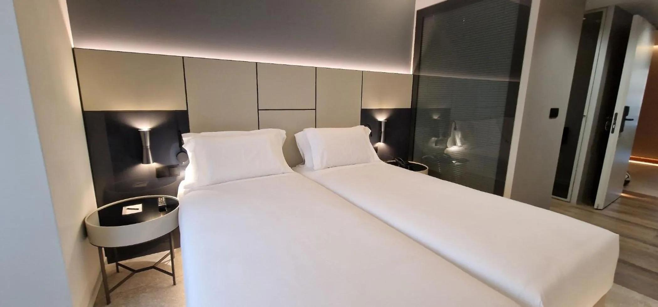 Bed in Bom Sucesso Hotel by gaiarooms