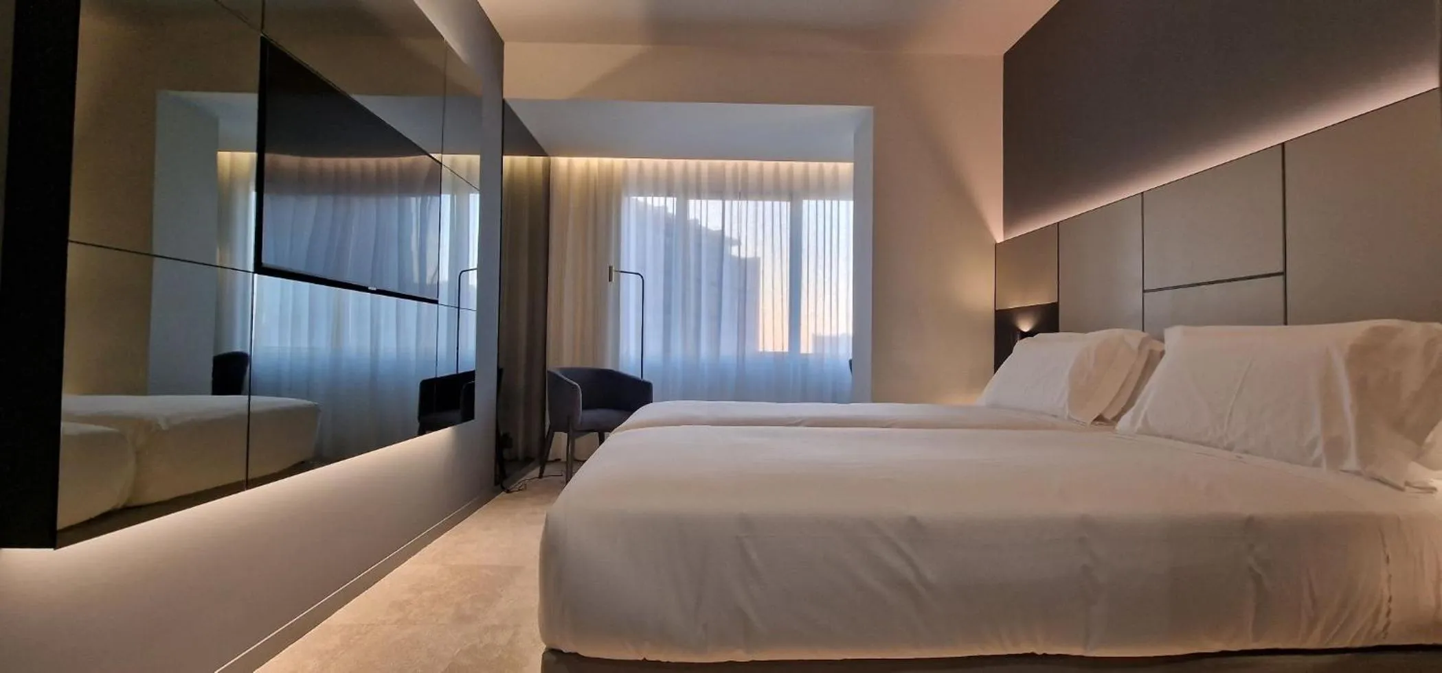 Bed in Bom Sucesso Hotel by gaiarooms