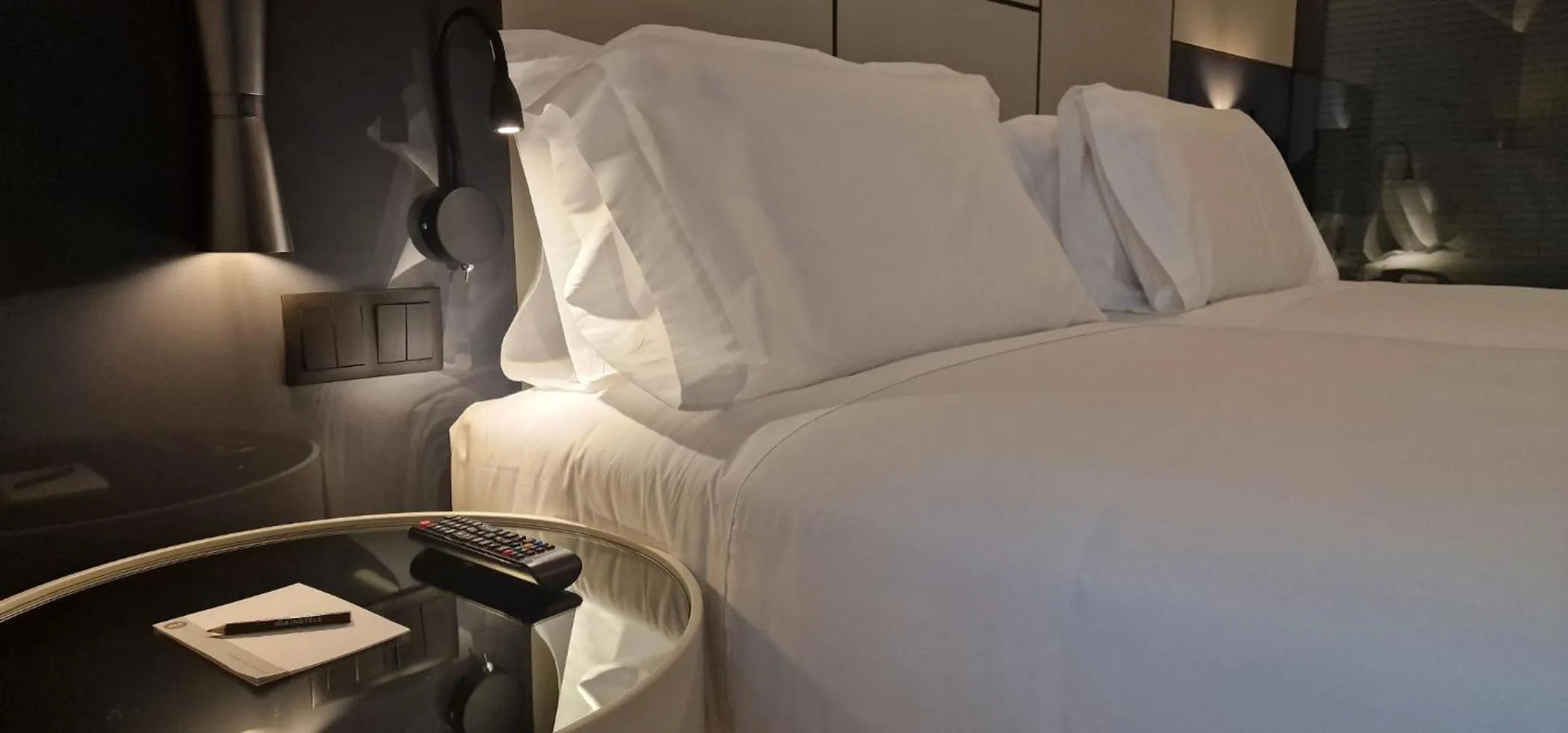 Bed in Bom Sucesso Hotel by gaiarooms