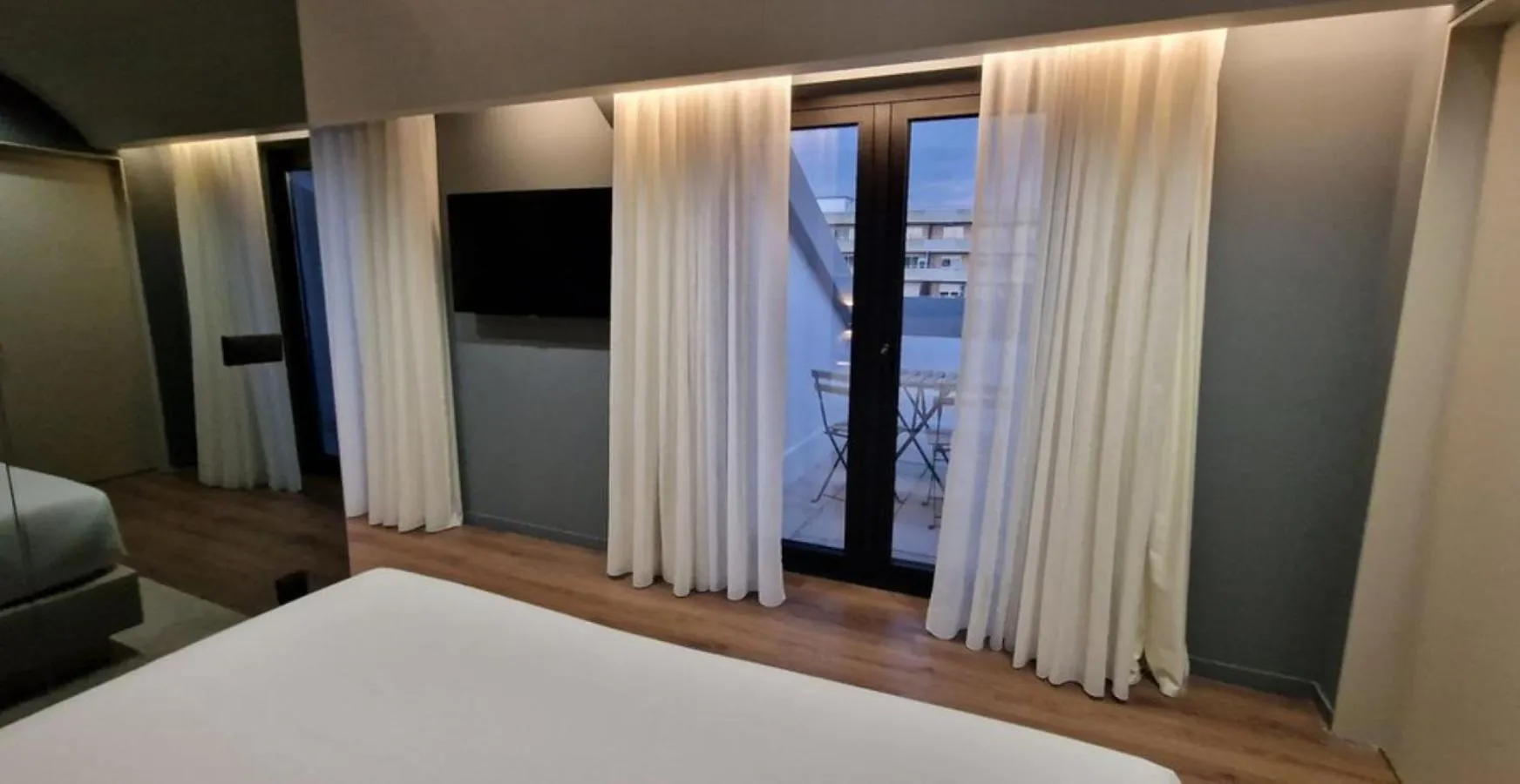 Bedroom, Bed in Bom Sucesso Hotel by gaiarooms