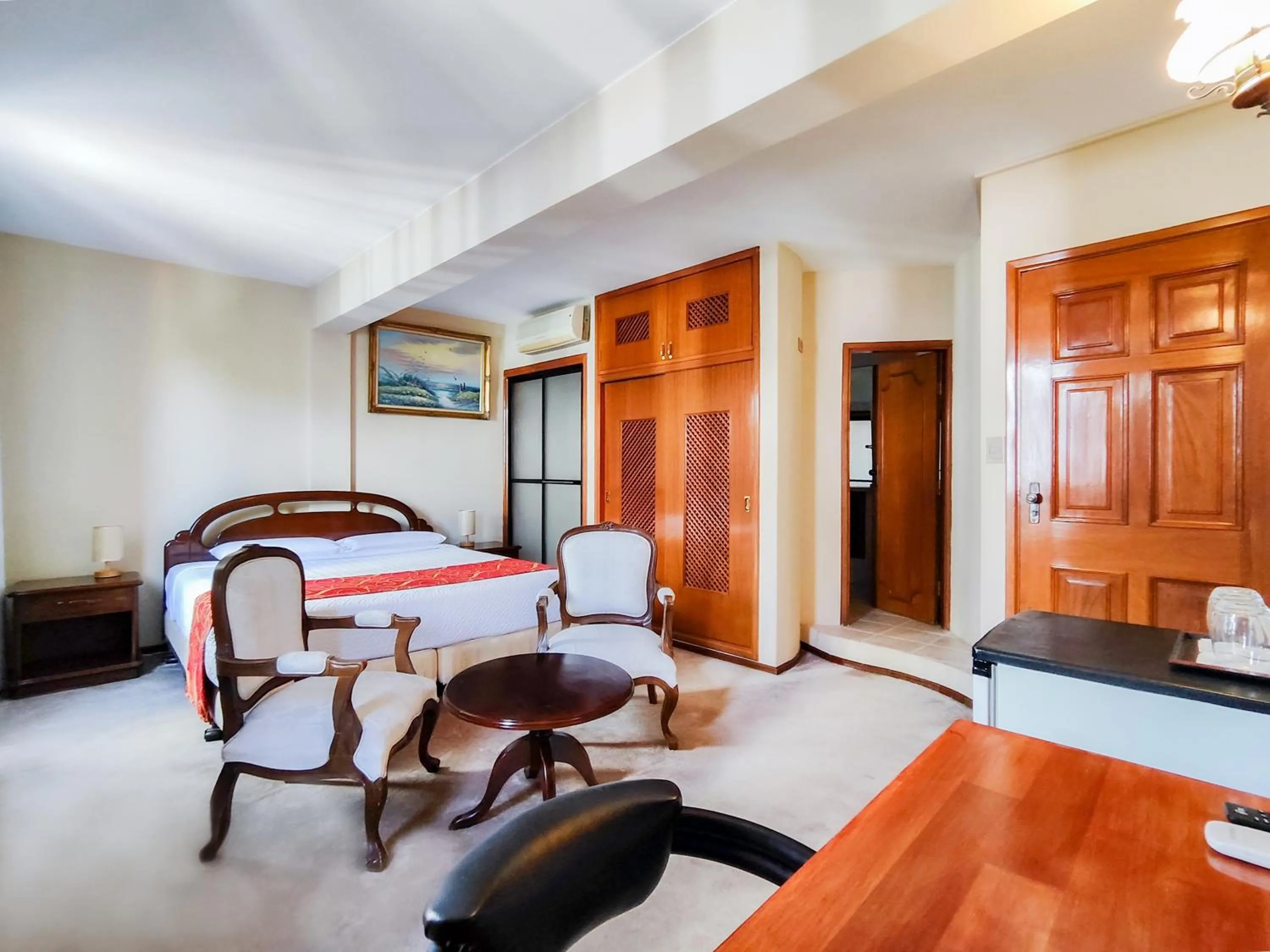 Seating area, Bed in Lido Hotel