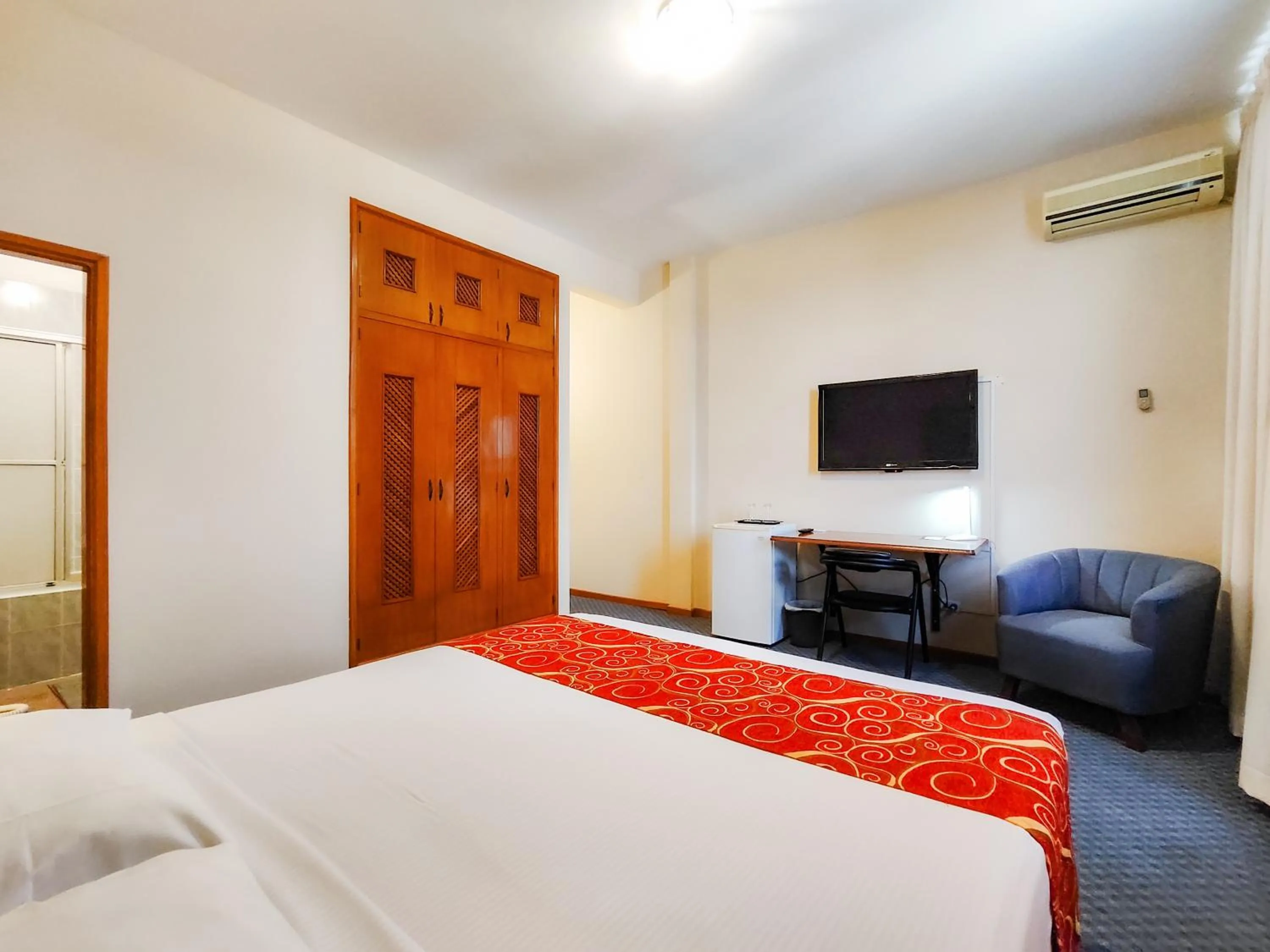 Seating area, Bed in Lido Hotel