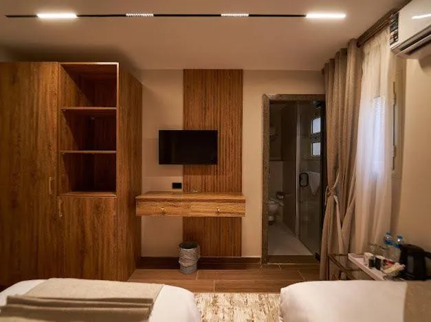 Bed in Gold's Pyramids Hotel