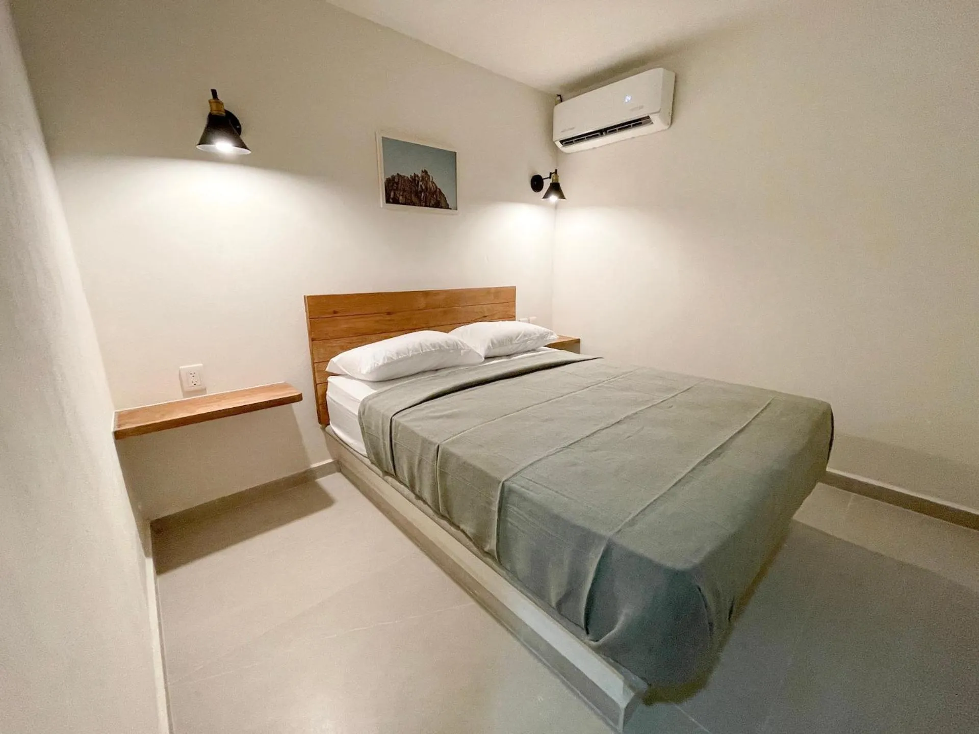 Bed in Rooms Huatulco