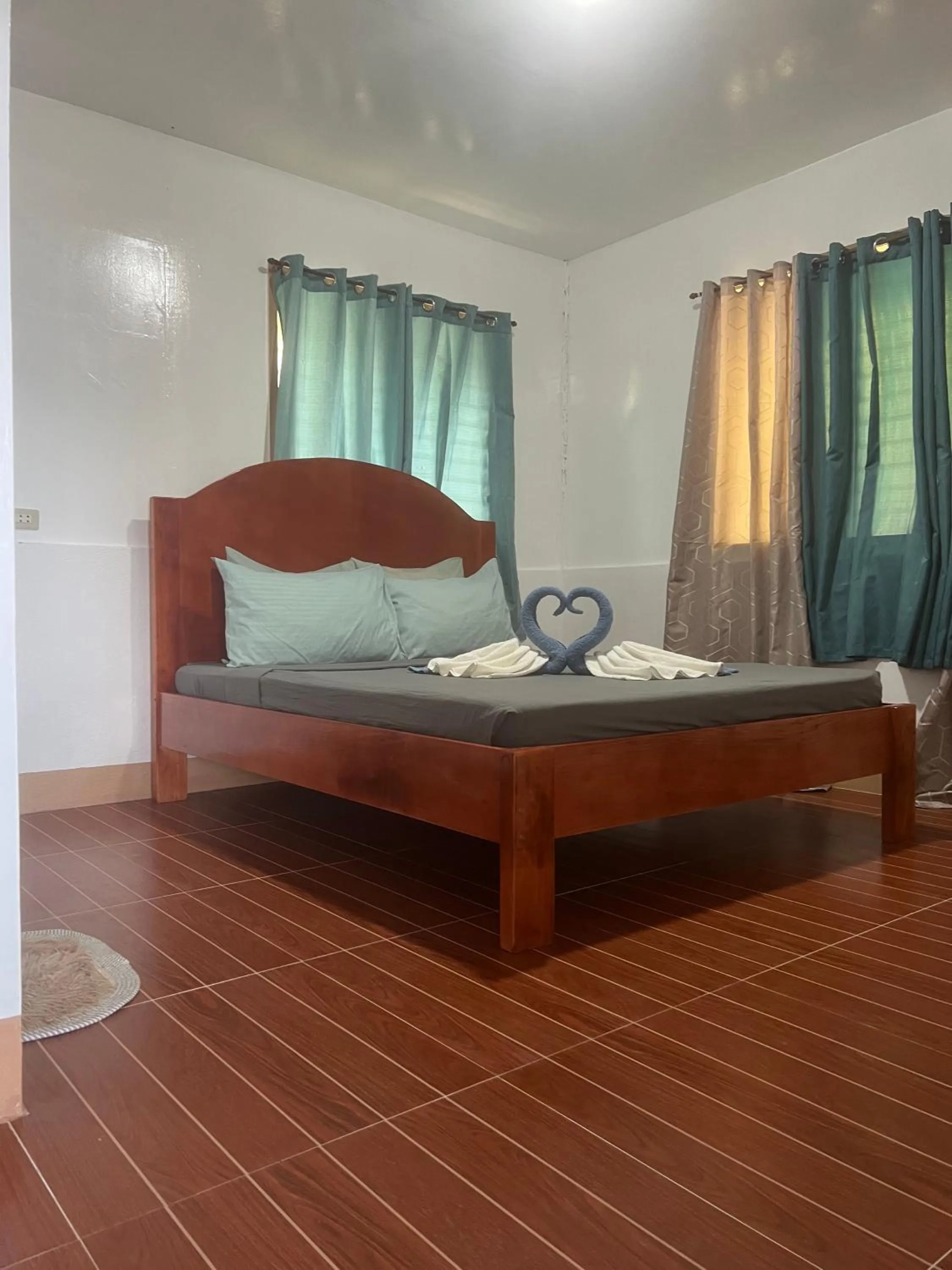 Bed in Gratum Beach Resort