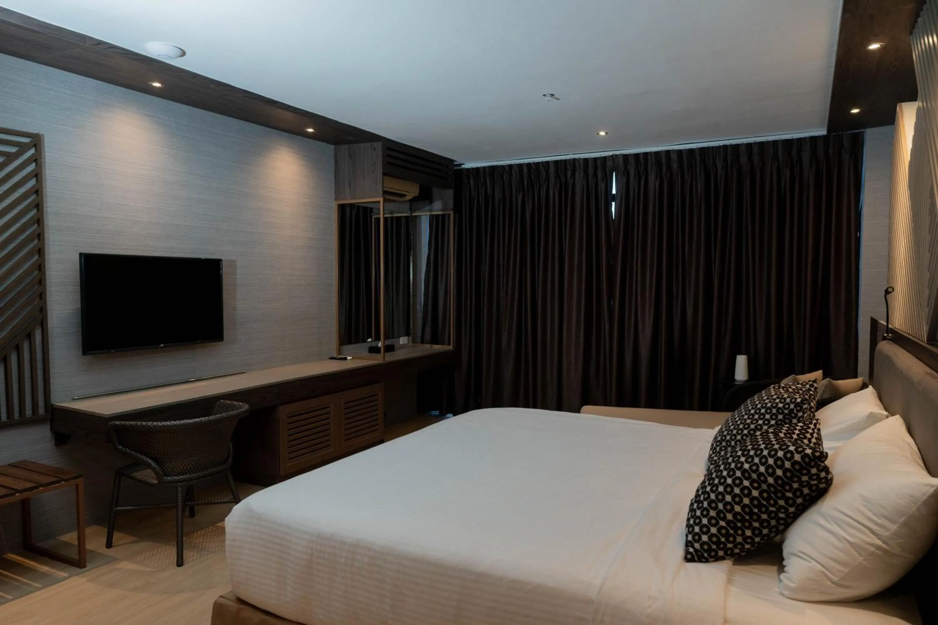 Bed in Adelina Hotel and Suites