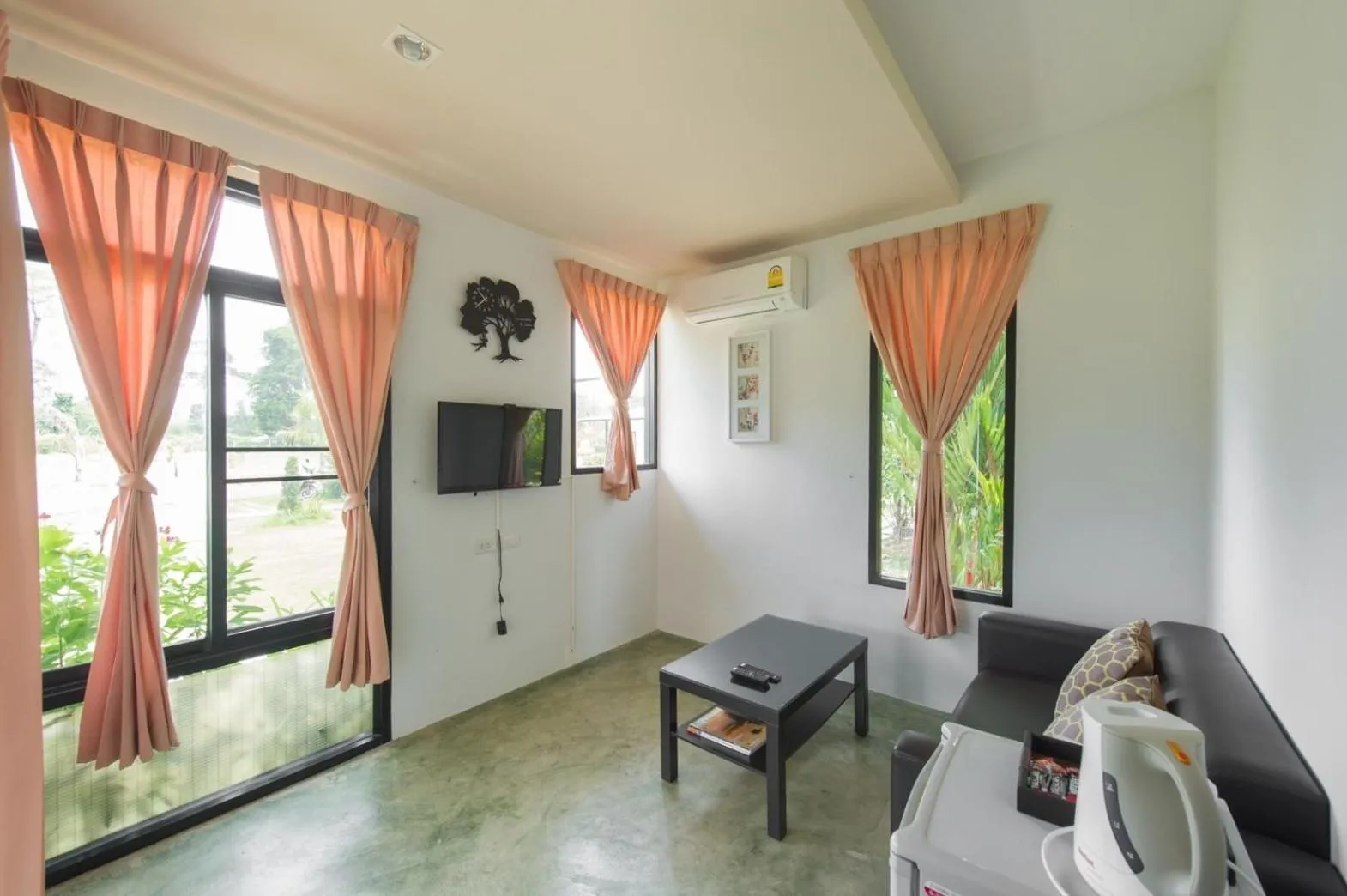 Communal lounge/ TV room in Suptara Resort