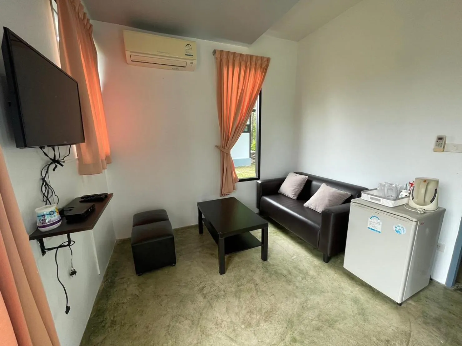 Communal lounge/ TV room in Suptara Resort