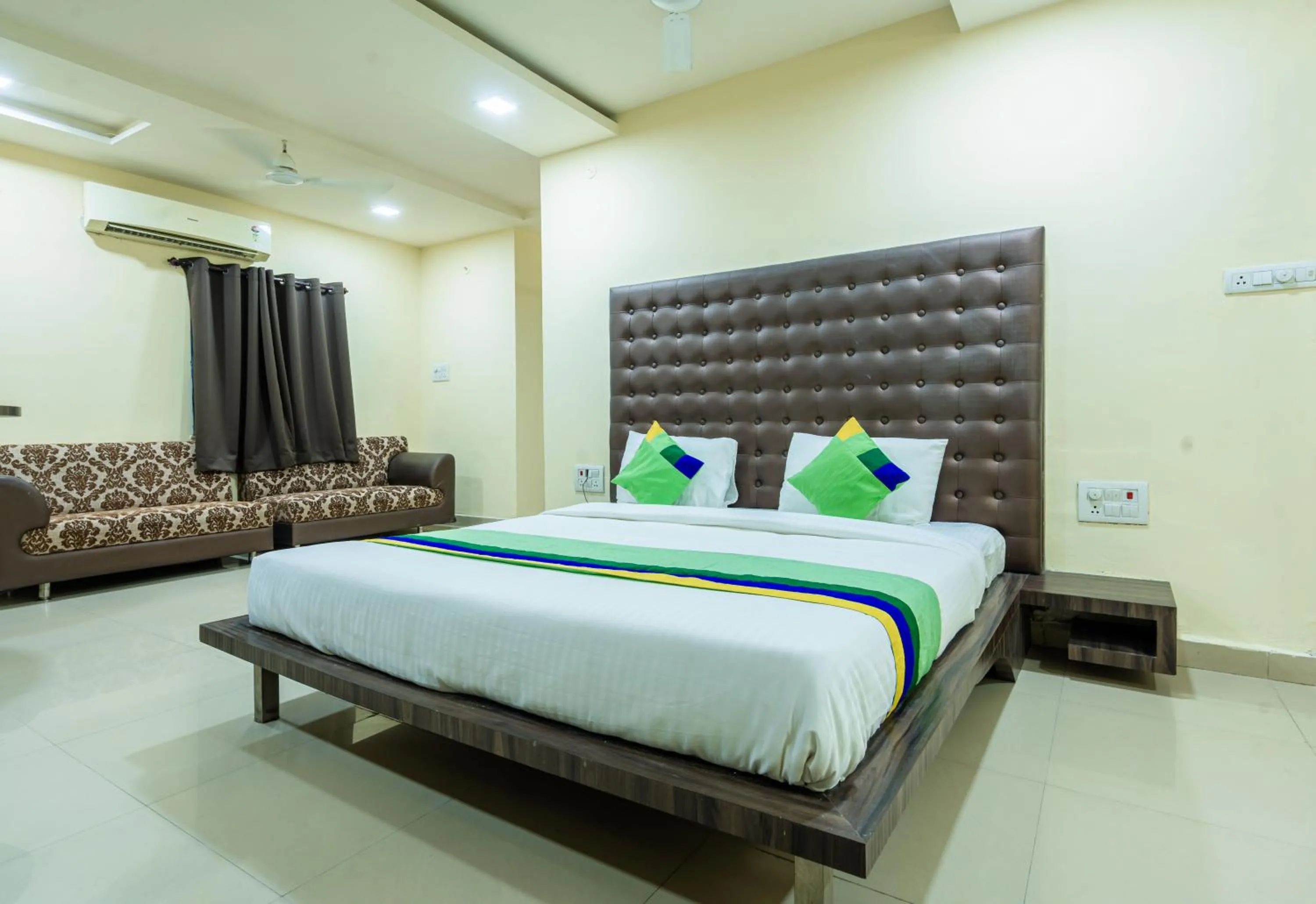 Bedroom, Bed in Treebo Udyam Glory