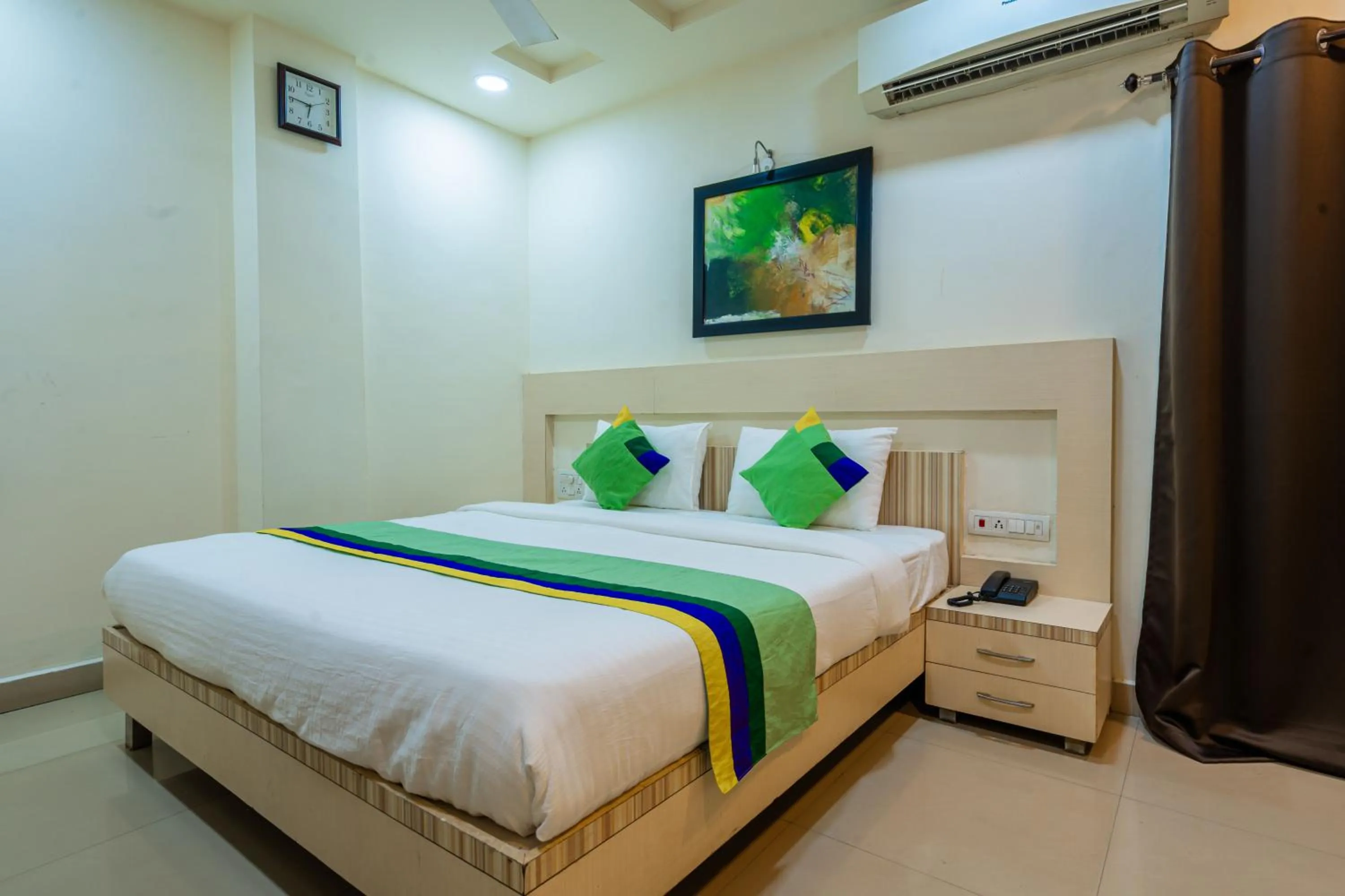 Bed in Treebo Udyam Glory