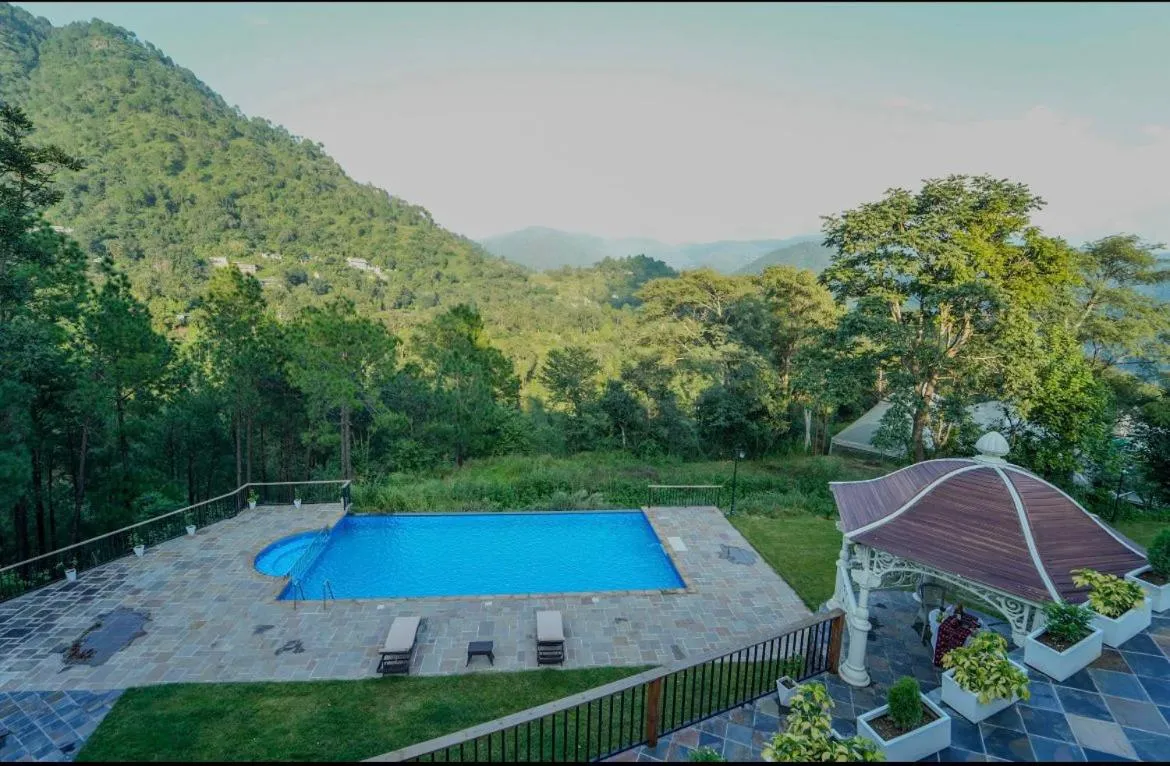 Swimming pool in Samsara Luxury Cottages & Spa, Chail Hills