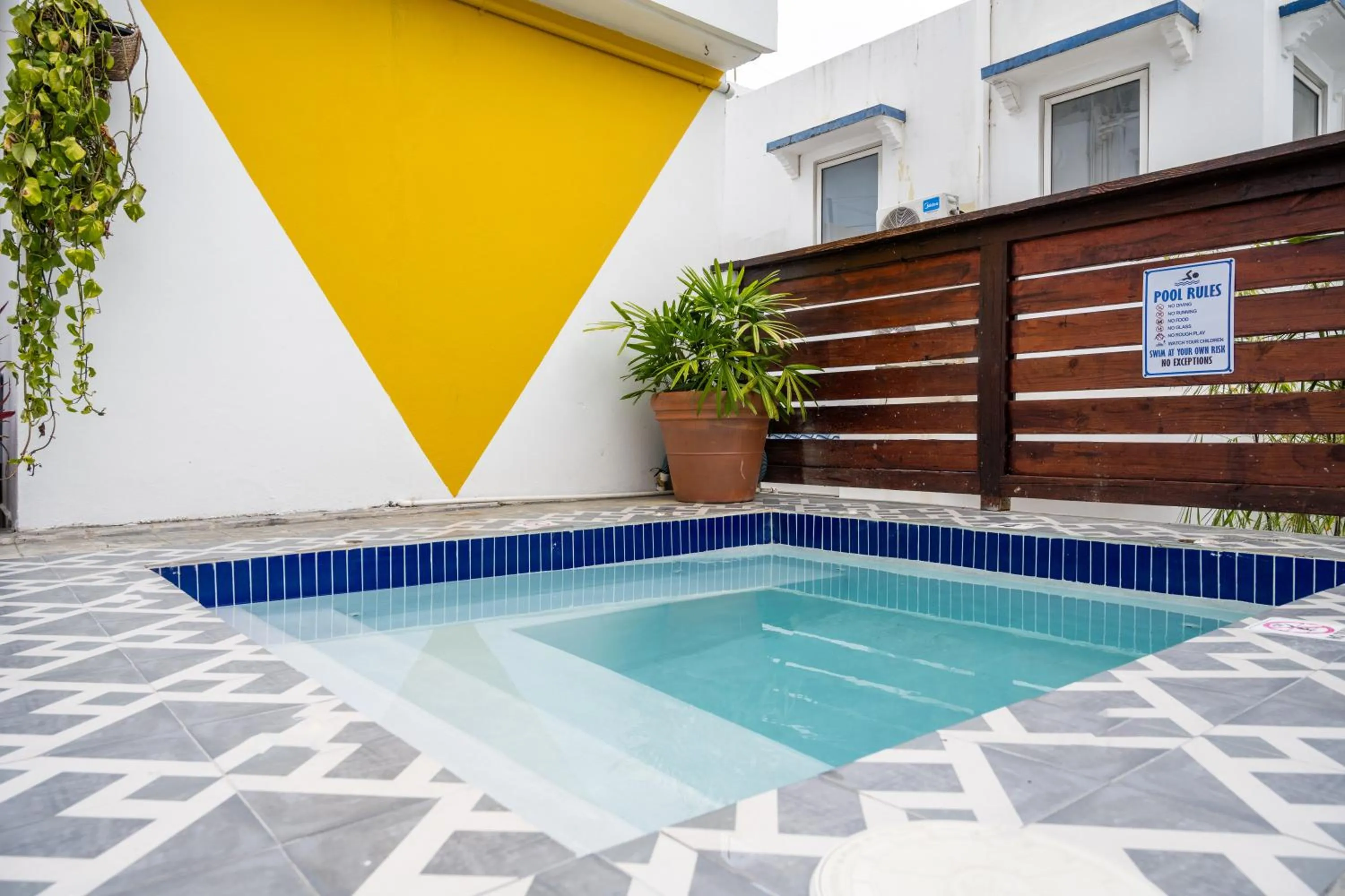 Swimming pool in La Mona Loiza Apartment Complex by Stay with Bear