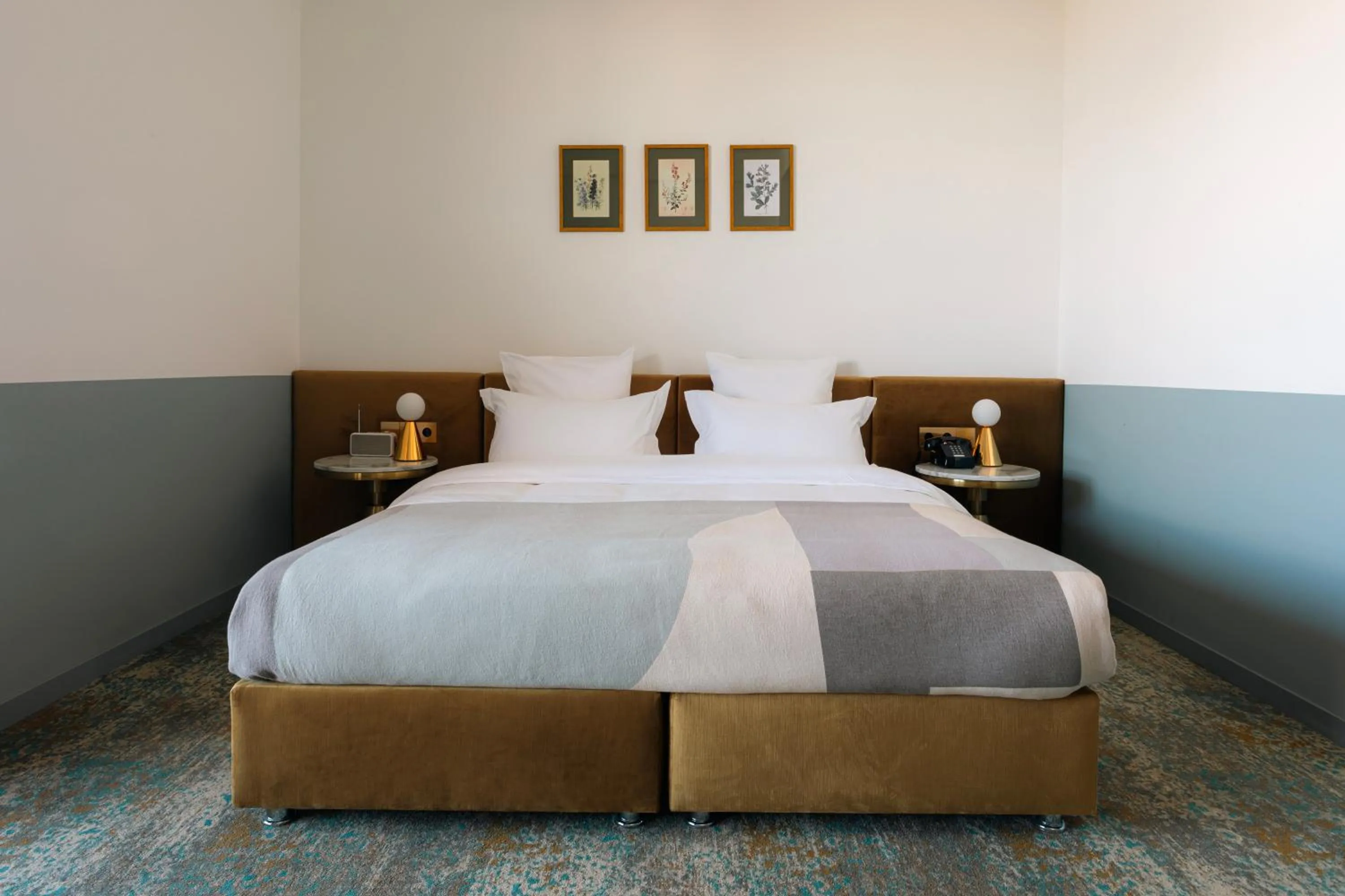 Bed in Castor & Pollux Hotel