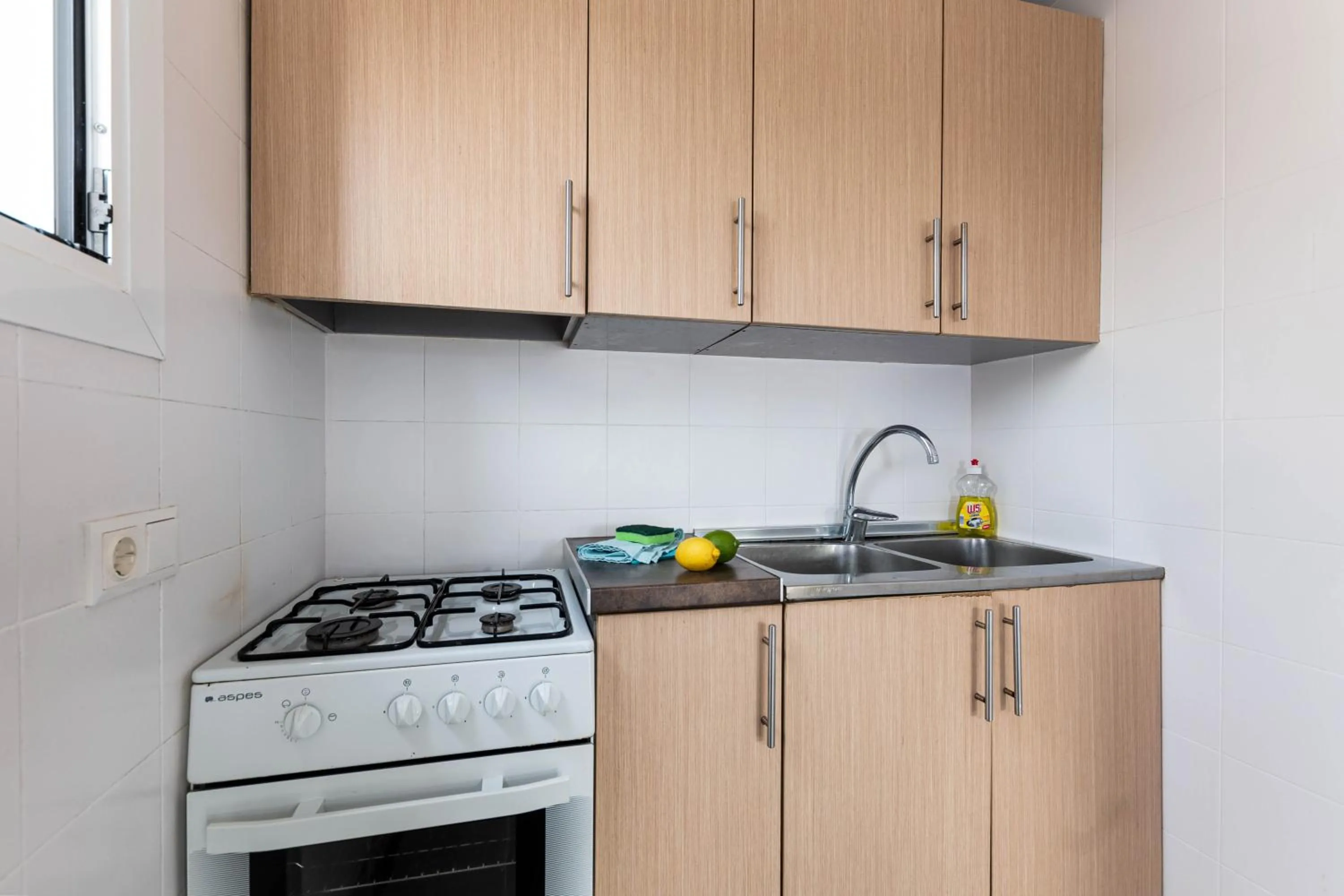 kitchen in Acapulco Apartments