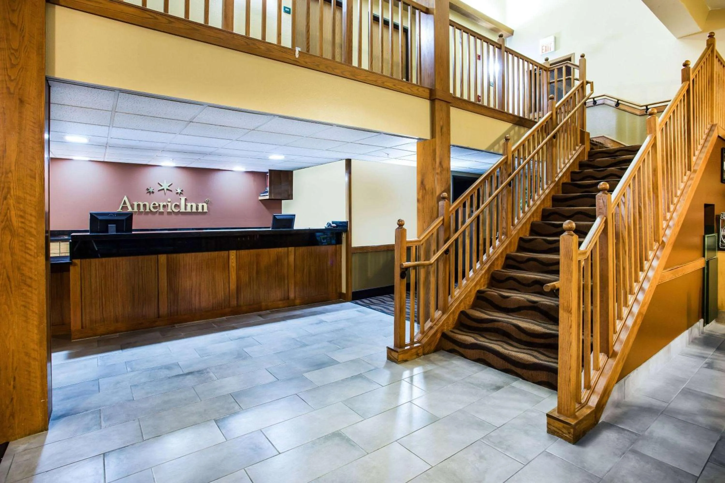 Lobby or reception in AmericInn by Wyndham Menomonie