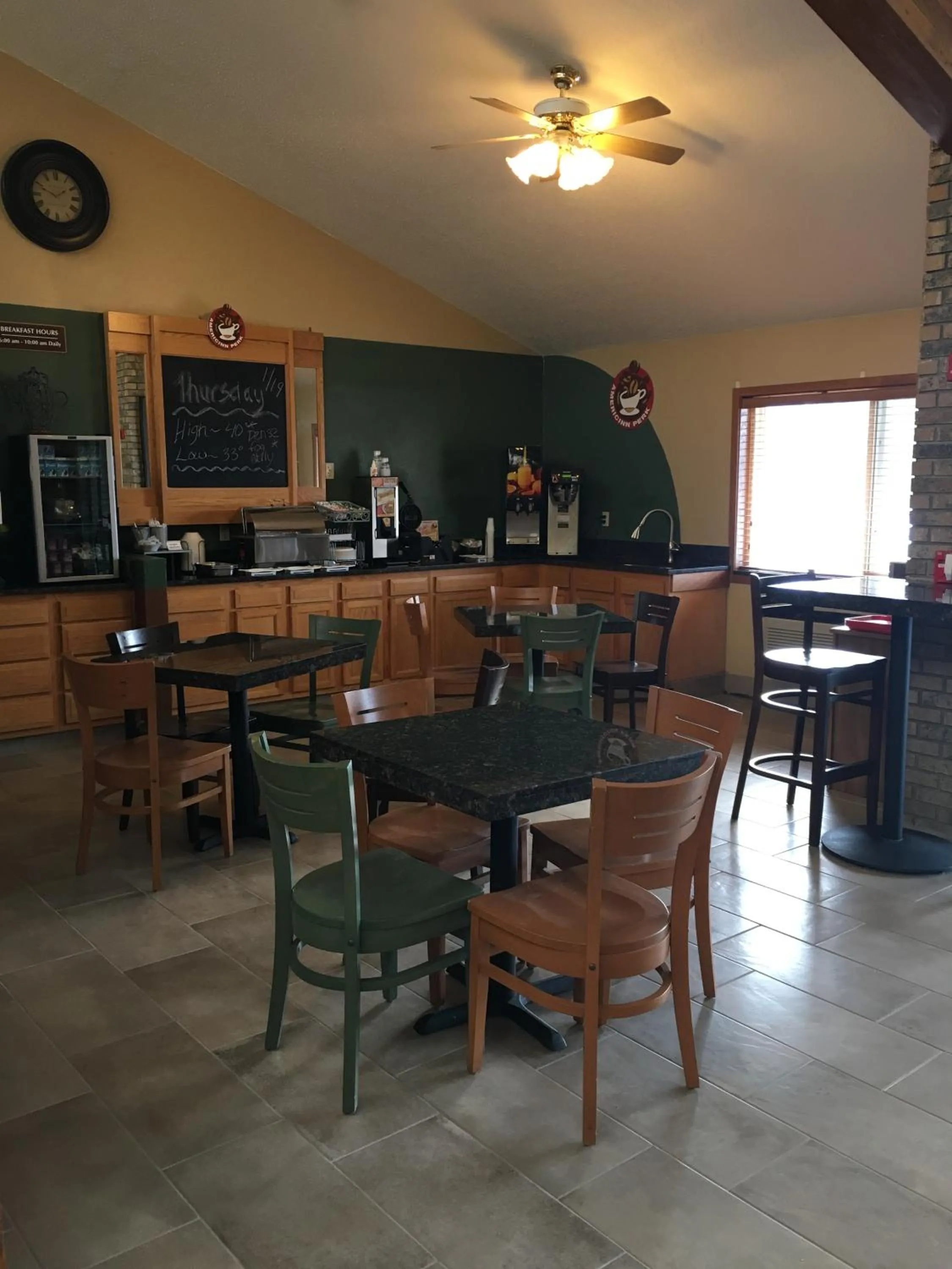 Dining area in AmericInn by Wyndham Menomonie