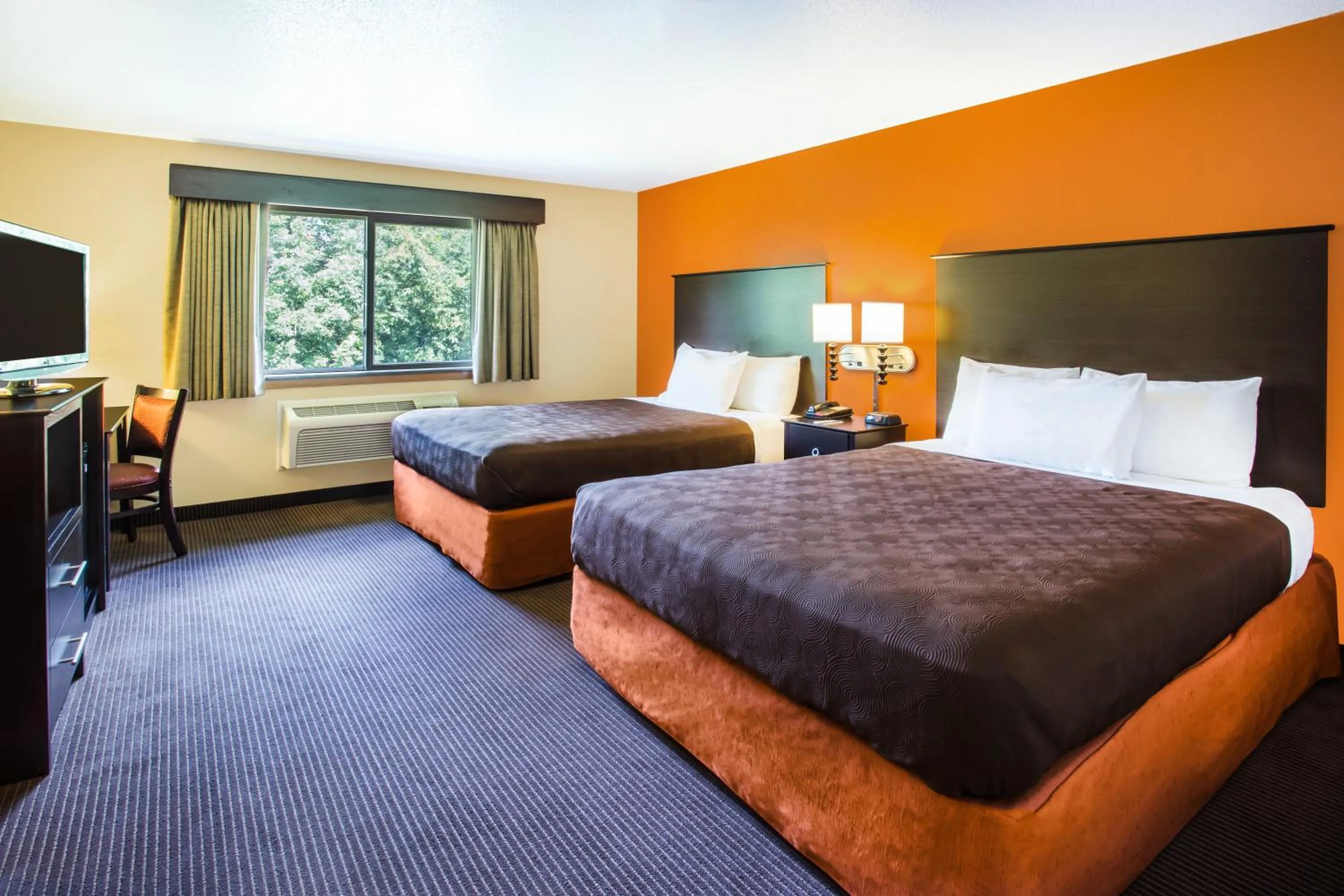 Bedroom, Bed in AmericInn by Wyndham Menomonie