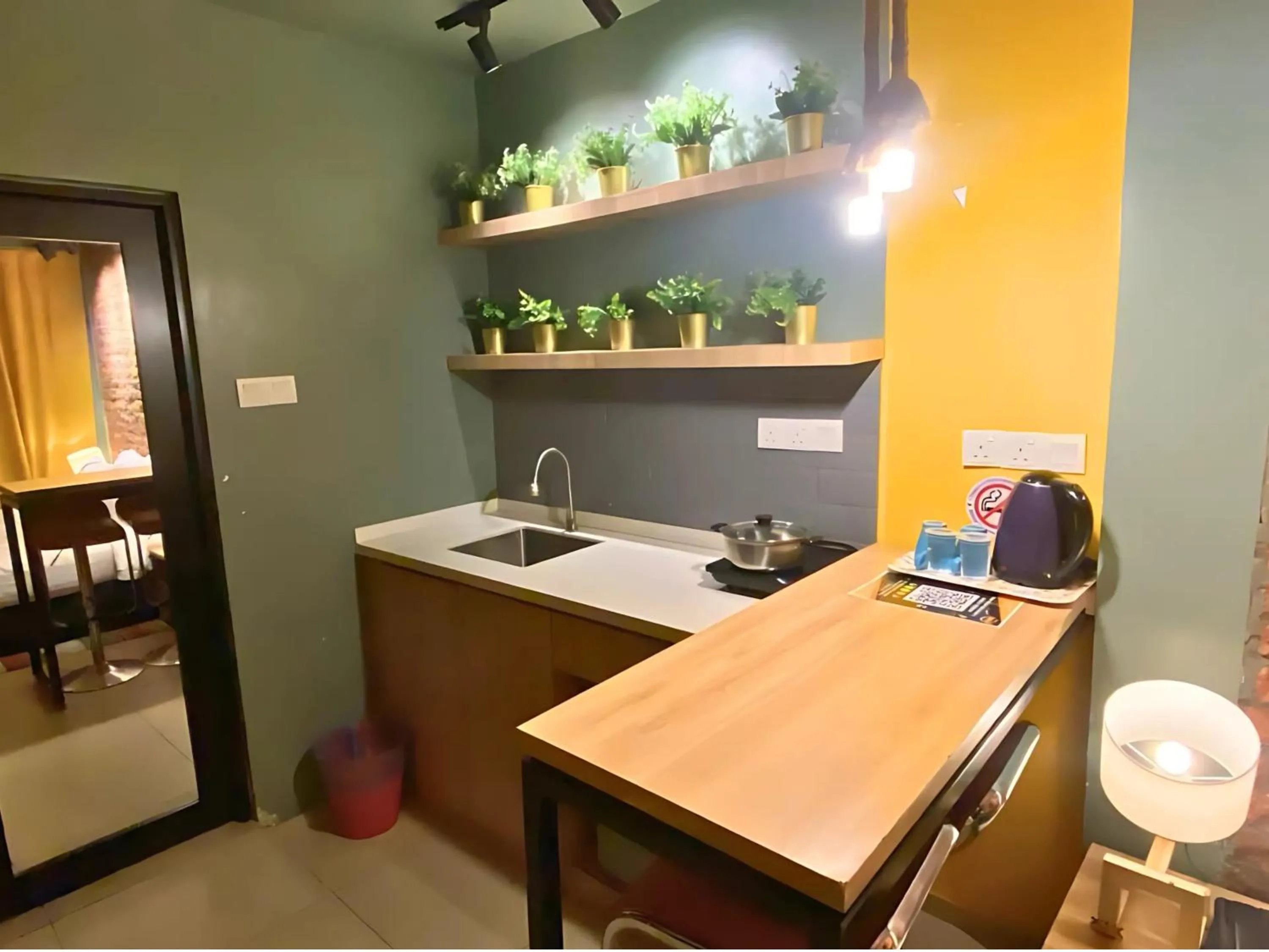Kitchen or kitchenette in Smile Hotel Danau Kota