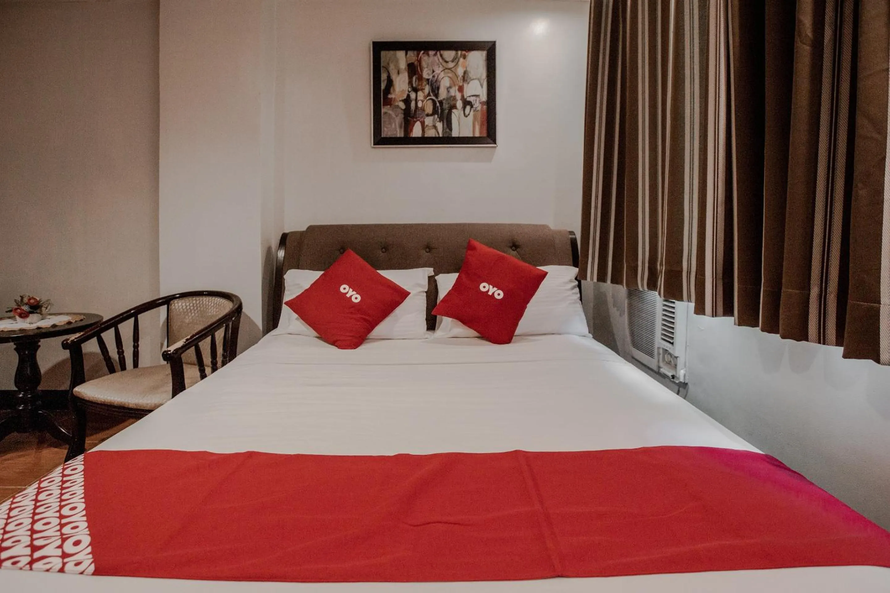 Bedroom, Bed in Super OYO 714 Haeinsa Condotel