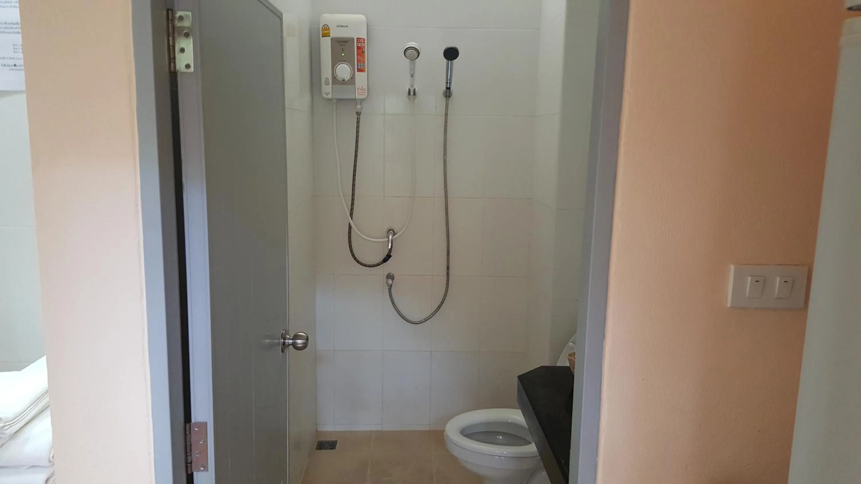 Bathroom in Jirasin Hotel & Apartment