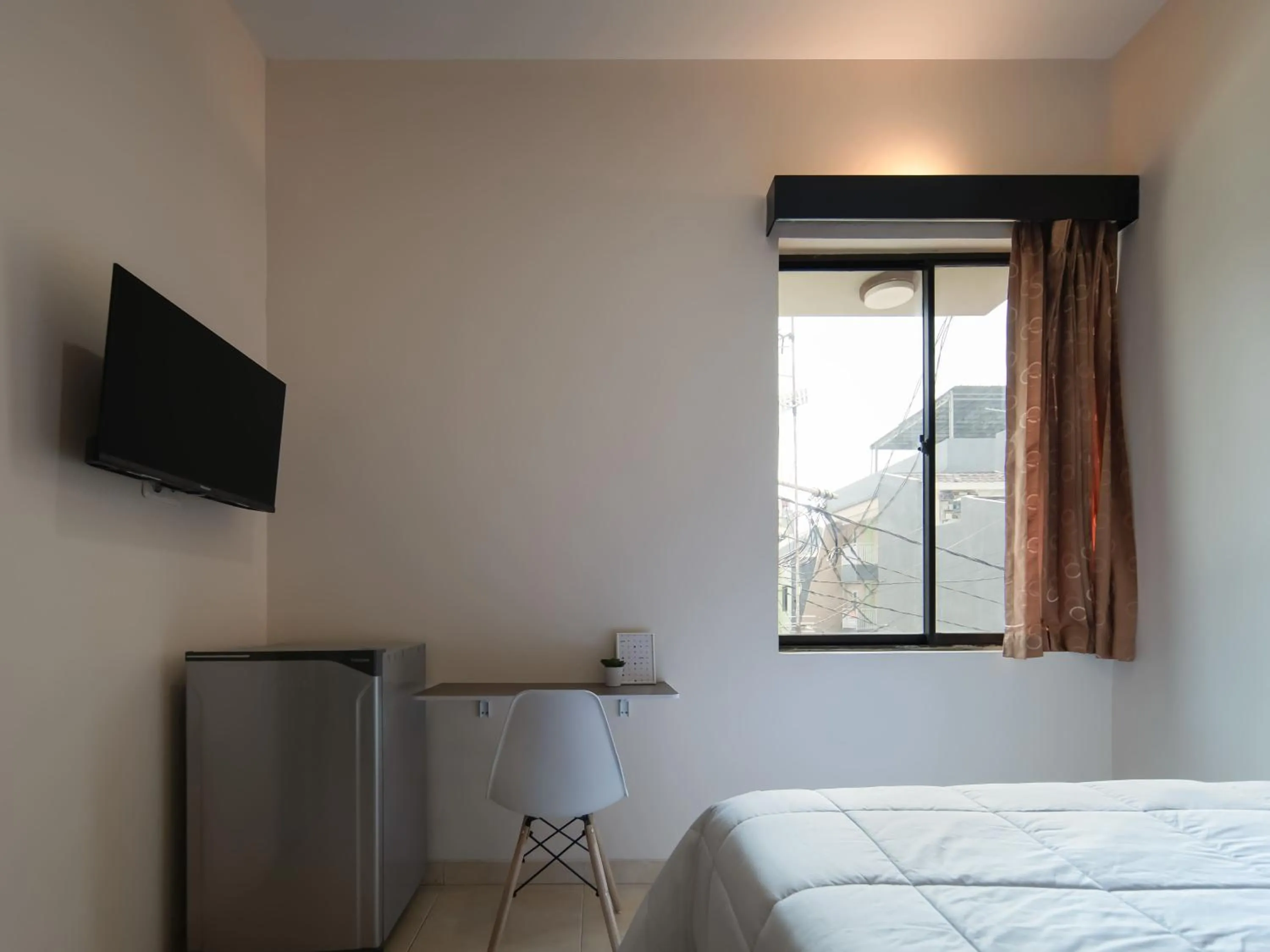 Bedroom, TV/Entertainment Center in Cove Oekude Residence