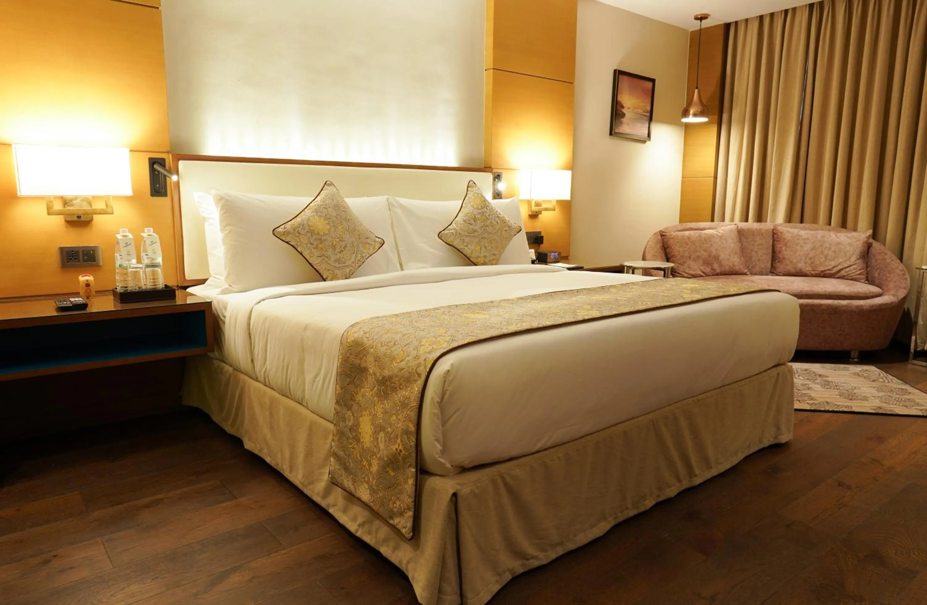 Bedroom, Bed in Gokulam Grand Trivandrum
