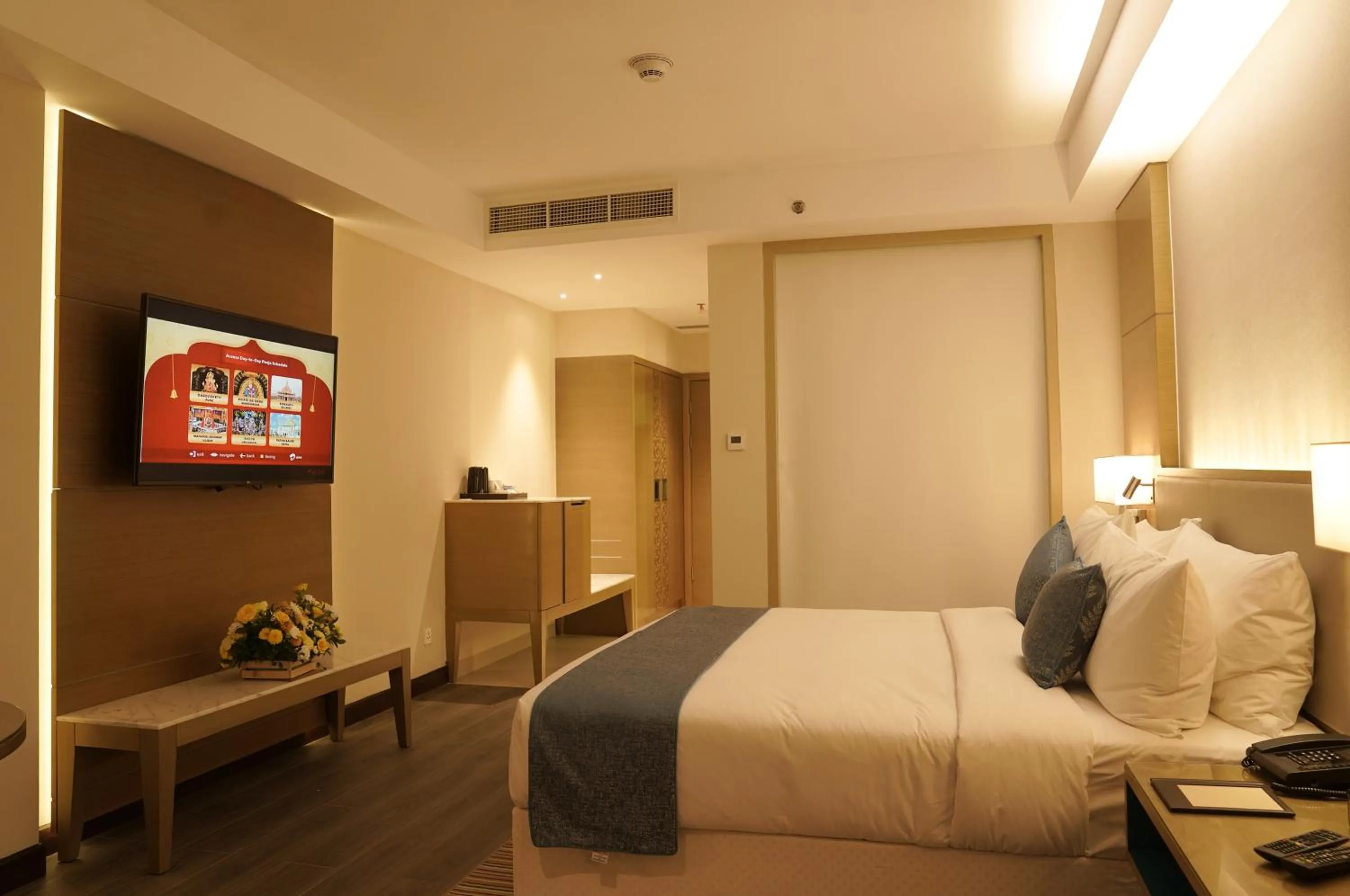 Bedroom, Bed in Gokulam Grand Trivandrum