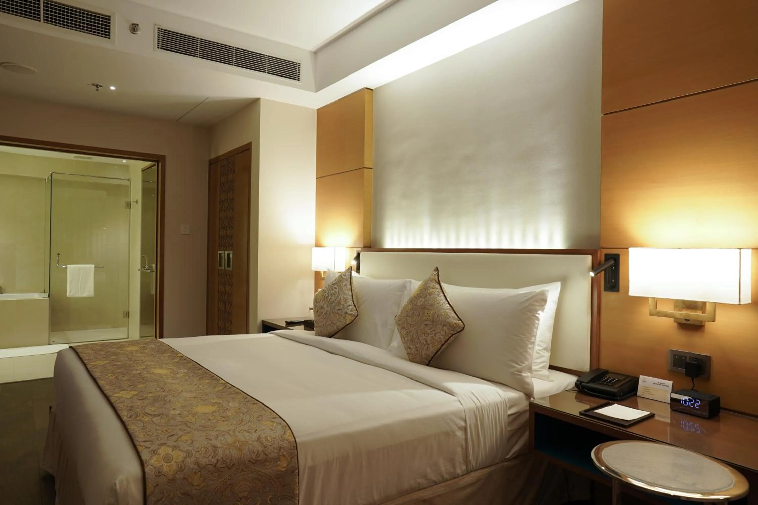 Bedroom, Bed in Gokulam Grand Trivandrum