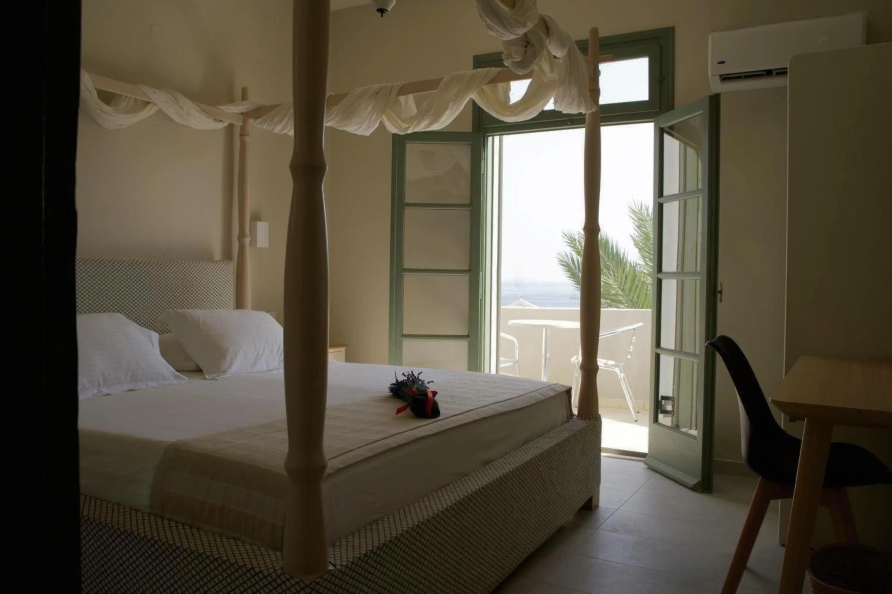 Photo of the whole room, Bed in Kores Aegina